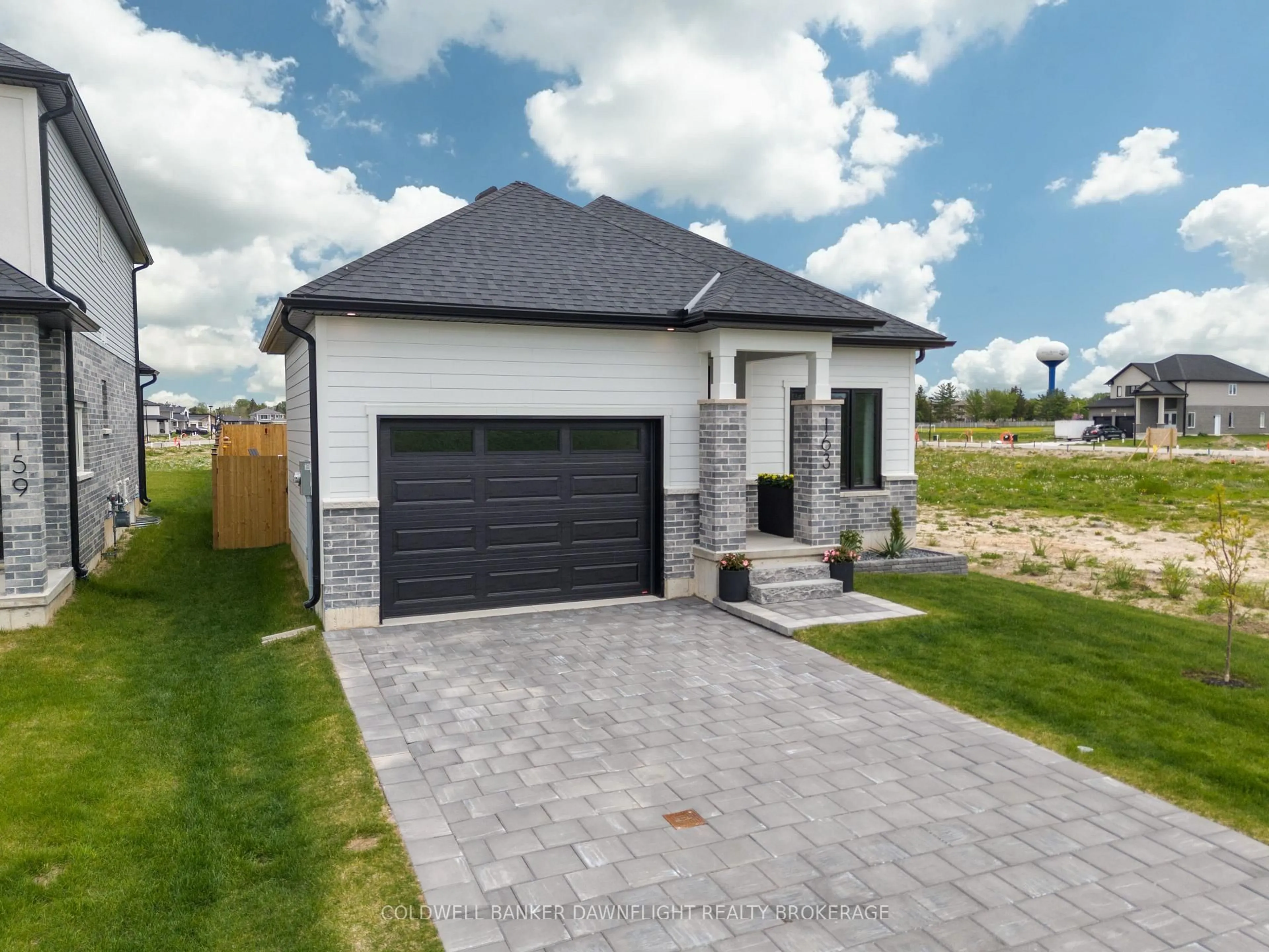 Home with brick exterior material, street for 219 Greene St, South Huron Ontario N0M 1S3