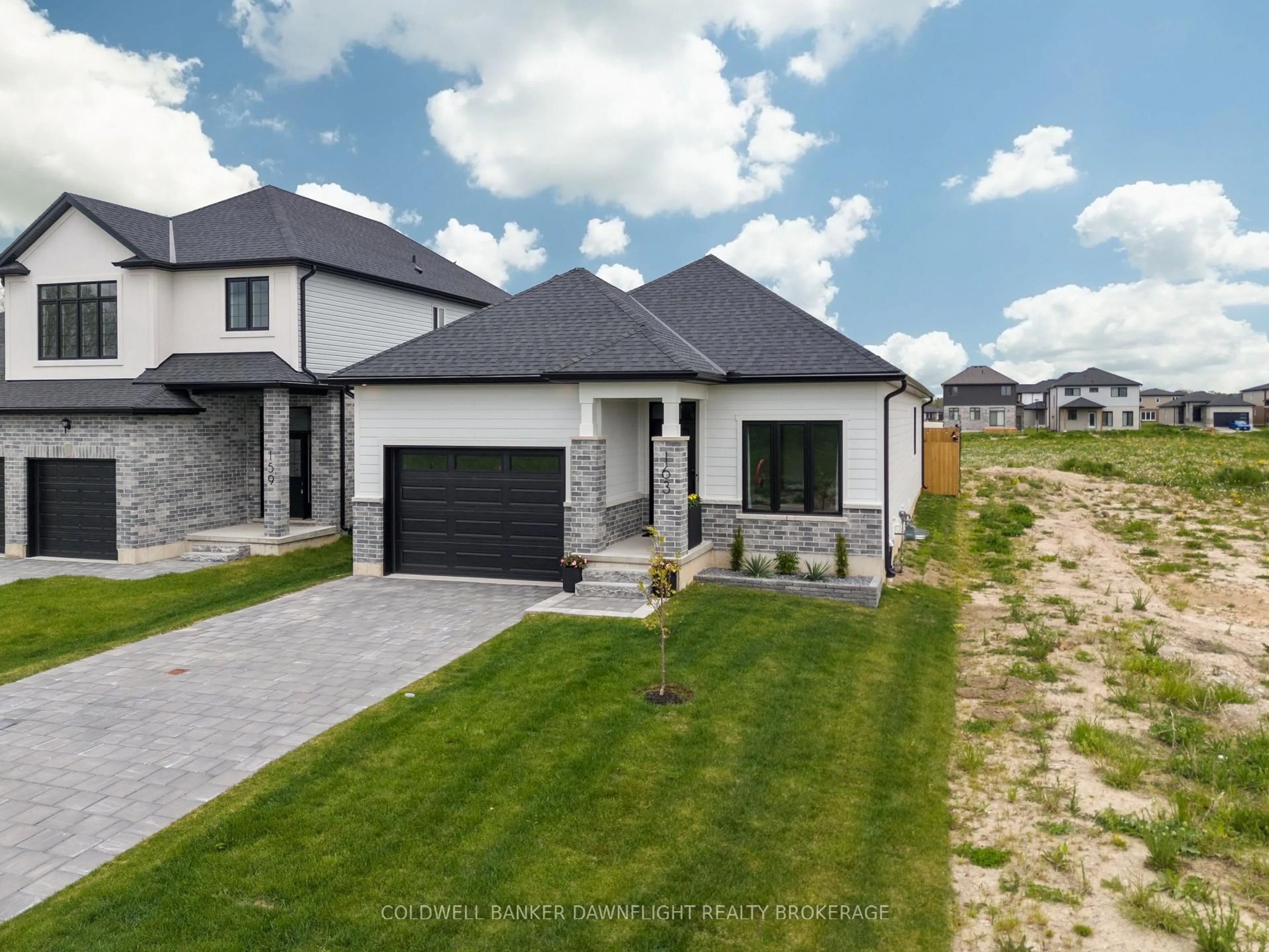 Home with brick exterior material, street for 219 Greene St, South Huron Ontario N0M 1S3