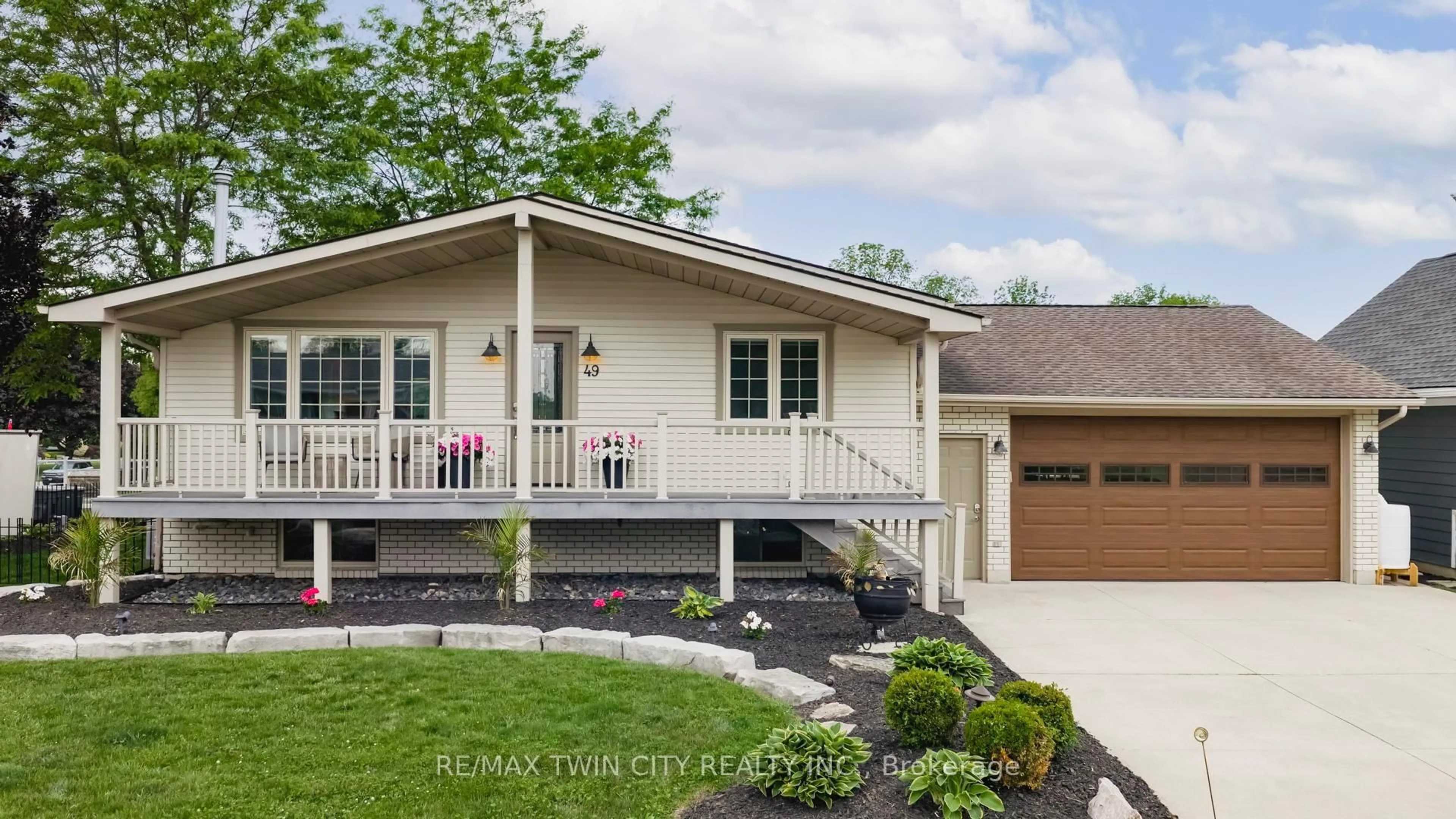 Home with vinyl exterior material, street for 49 Gill Rd, Lambton Shores Ontario N0M 1T0