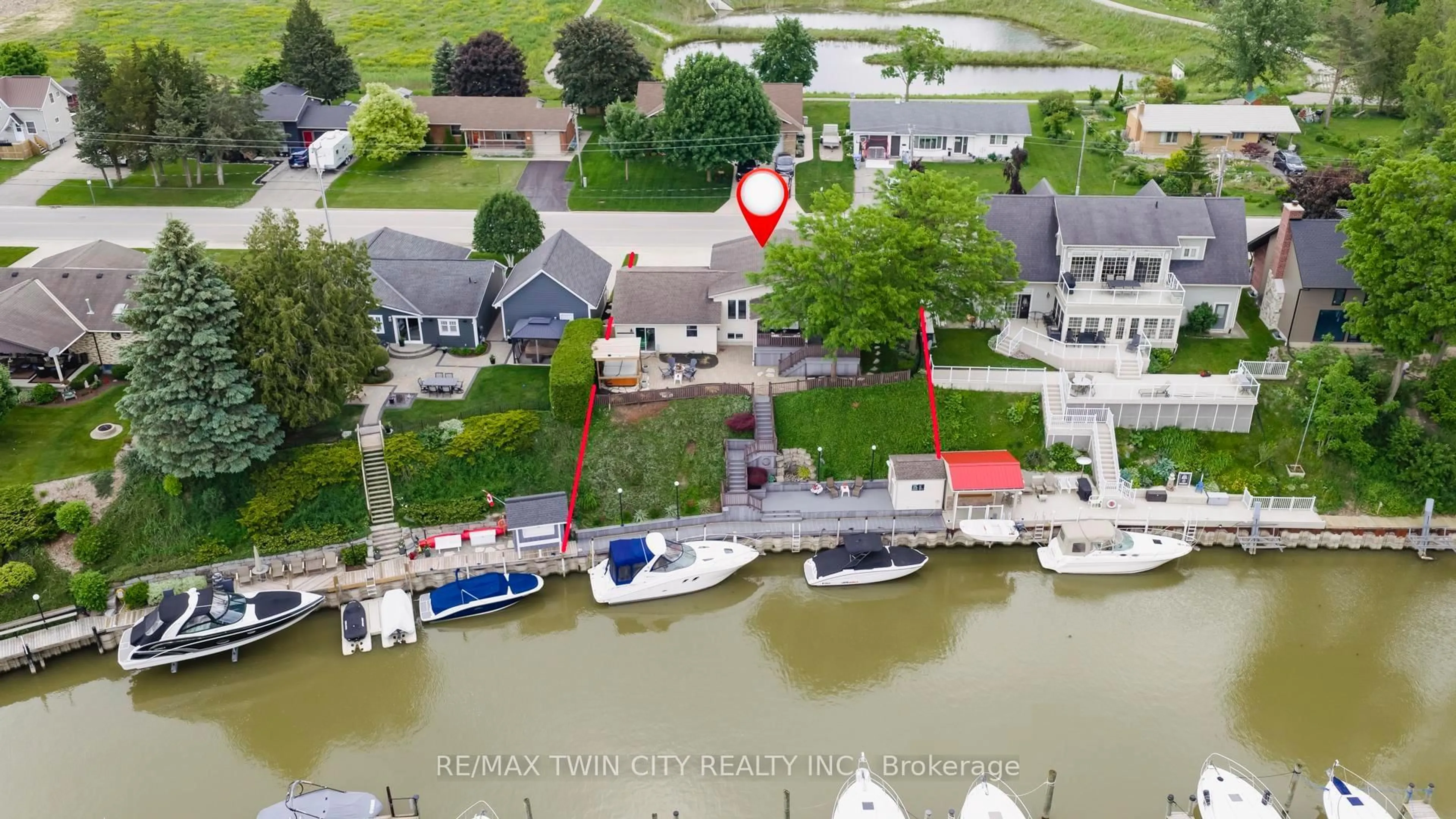 A pic from outside/outdoor area/front of a property/back of a property/a pic from drone, water/lake/river/ocean view for 49 Gill Rd, Lambton Shores Ontario N0M 1T0