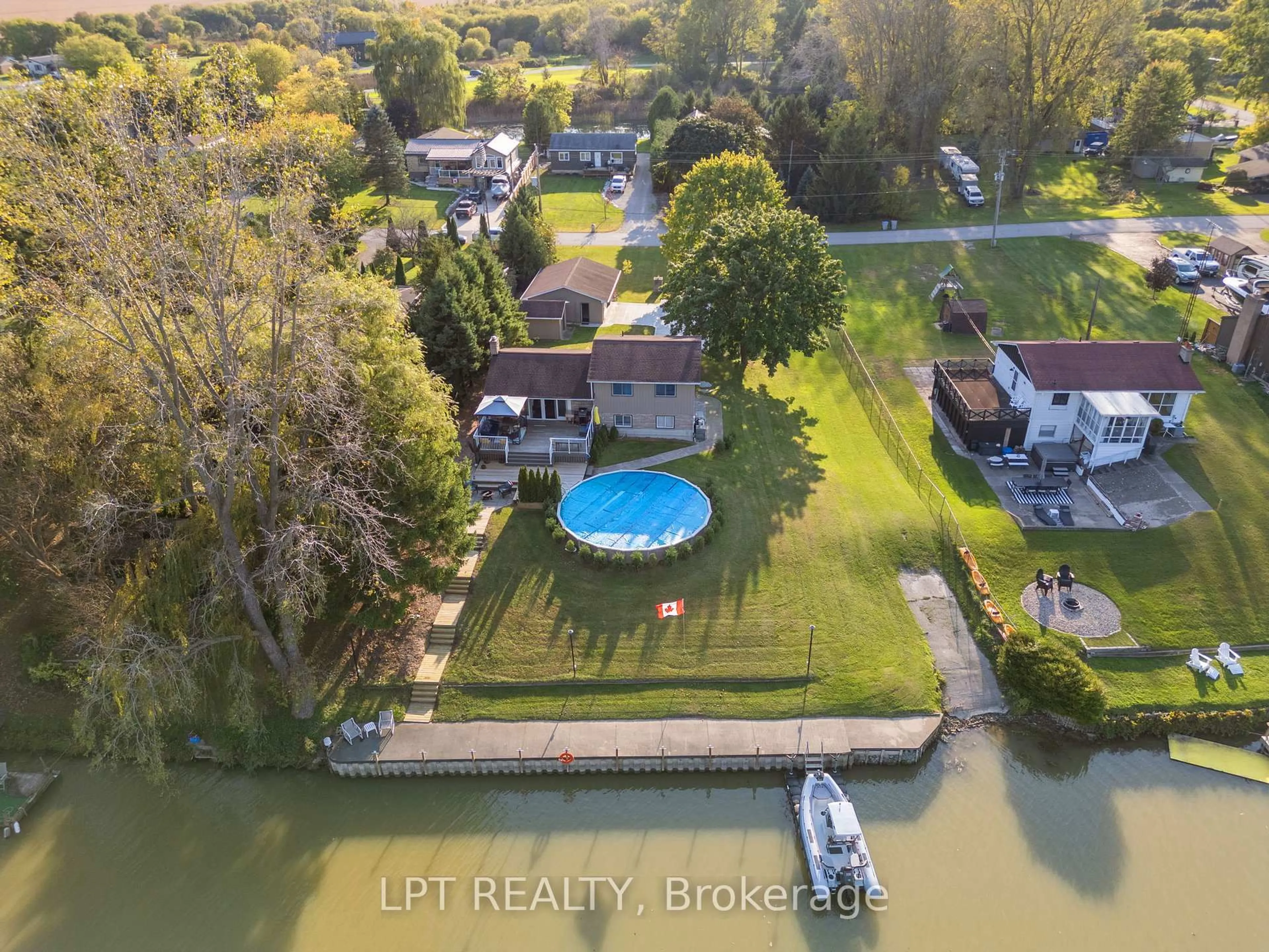 A pic from outside/outdoor area/front of a property/back of a property/a pic from drone, water/lake/river/ocean view for 9952 Prince Phillip St, Lambton Shores Ontario N0M 2N0