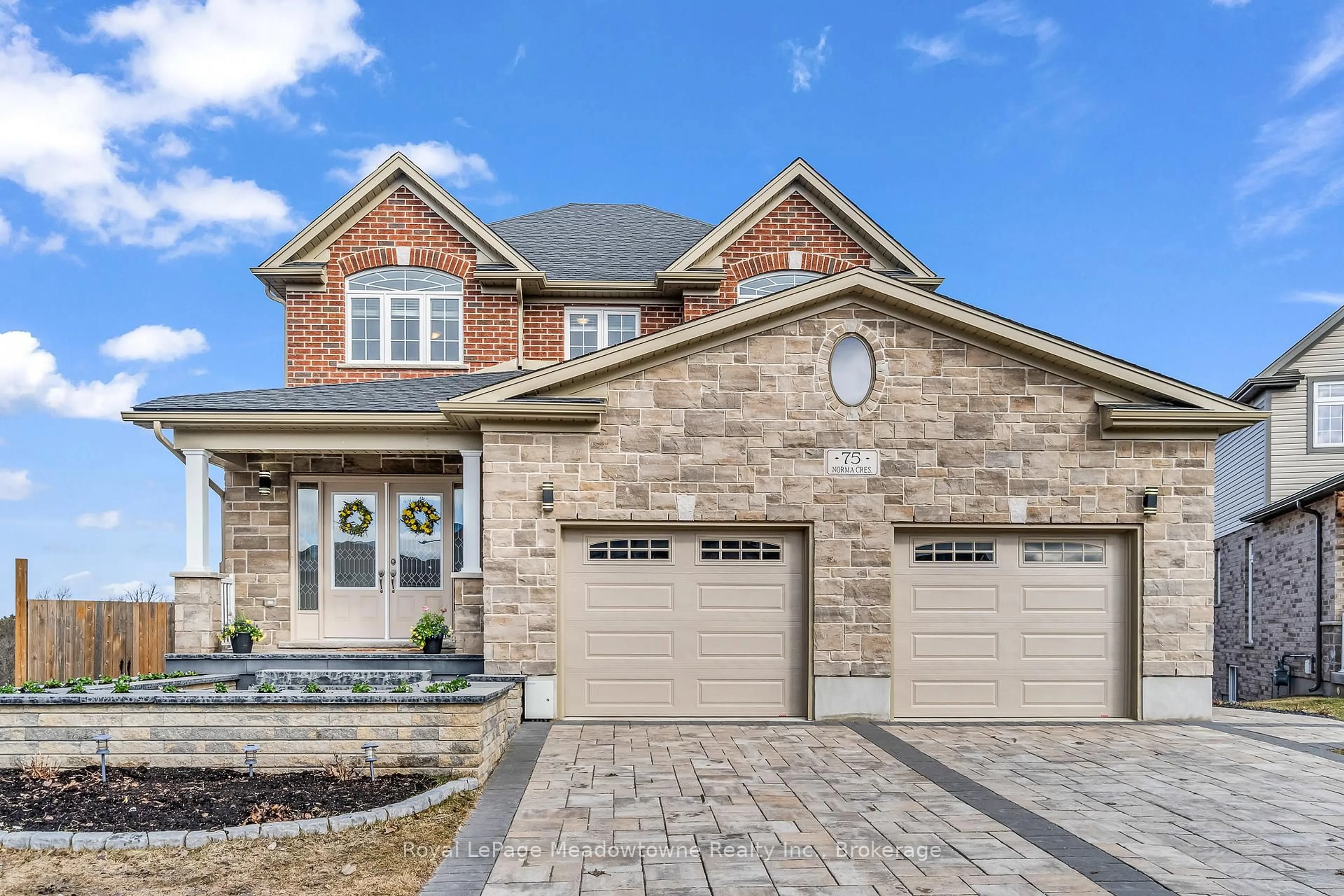 Home with brick exterior material, street for 75 Norma Cres, Guelph Ontario N1E 0K6