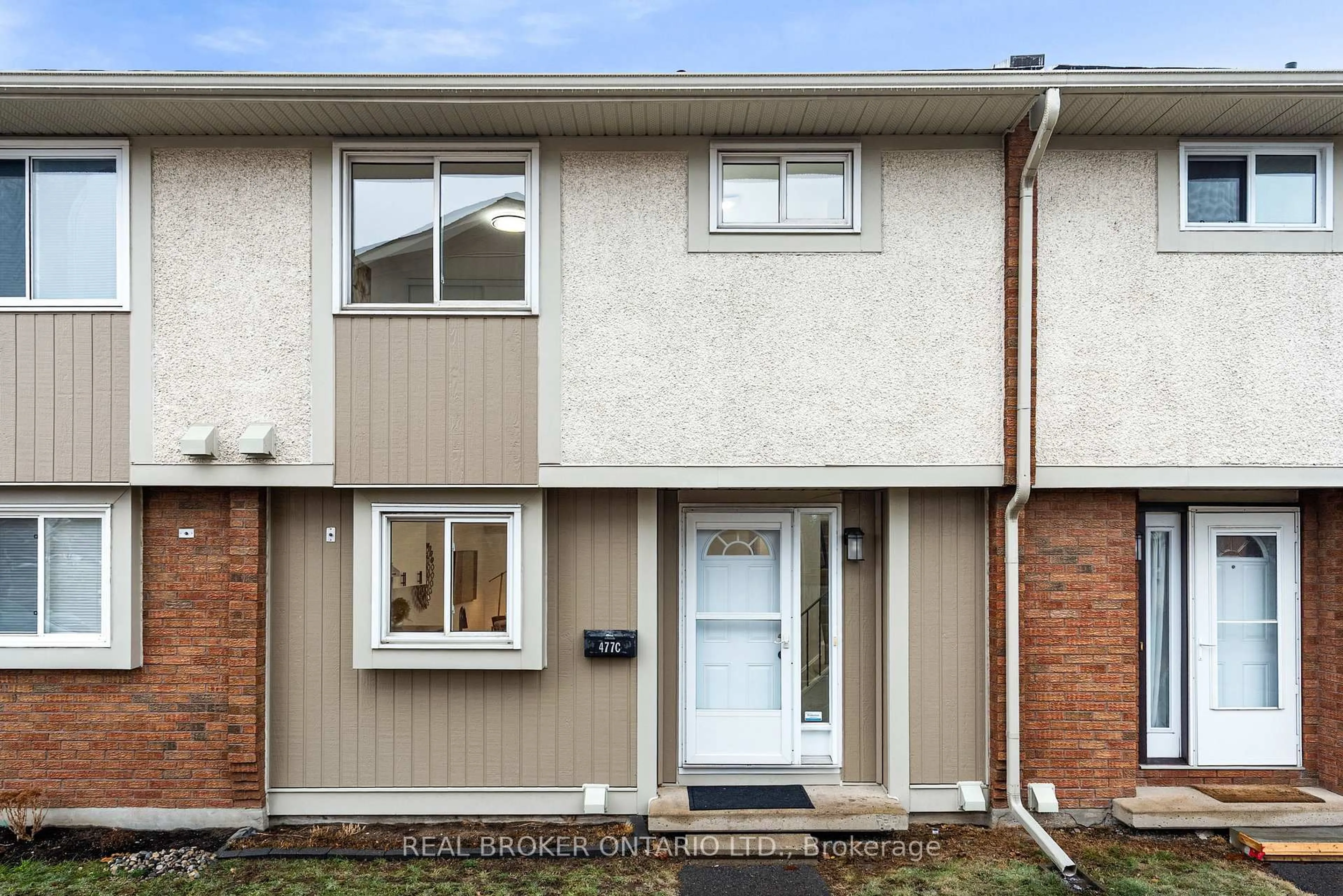 Home with vinyl exterior material, street for 477 Moodie Dr #C, Ottawa Ontario K2H 8T7