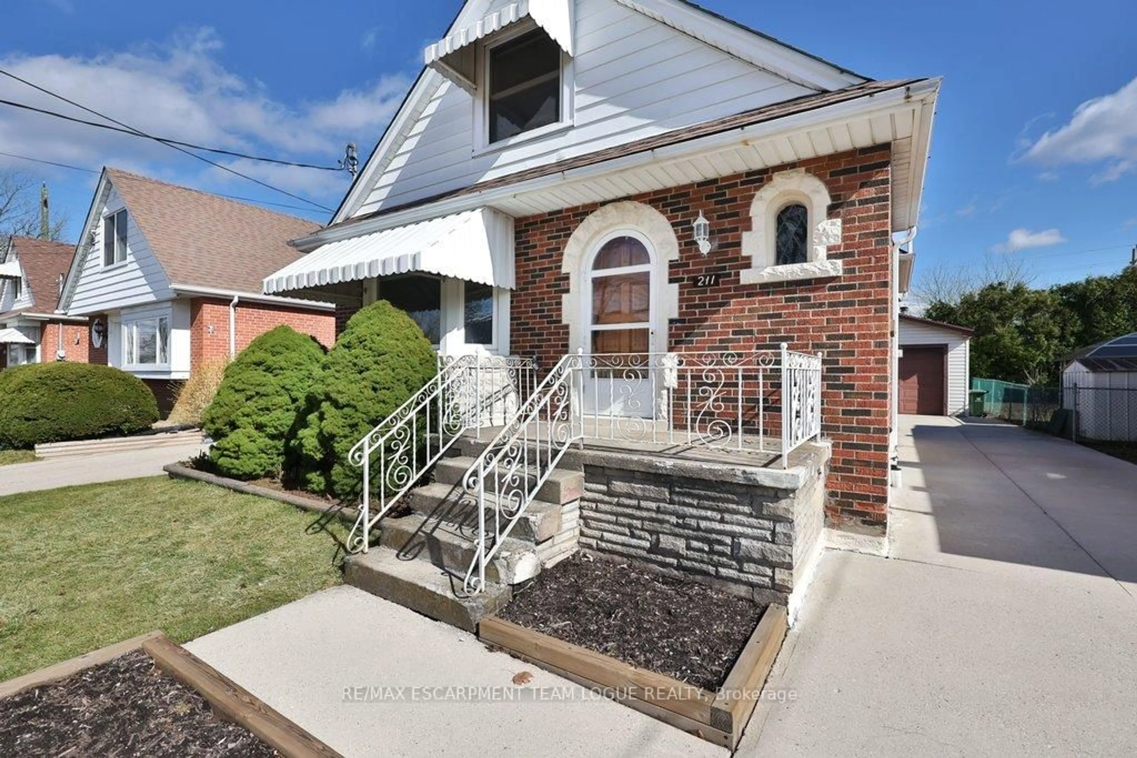 Home with brick exterior material, street for 211 Glencairn Ave, Hamilton Ontario L8K 3P1