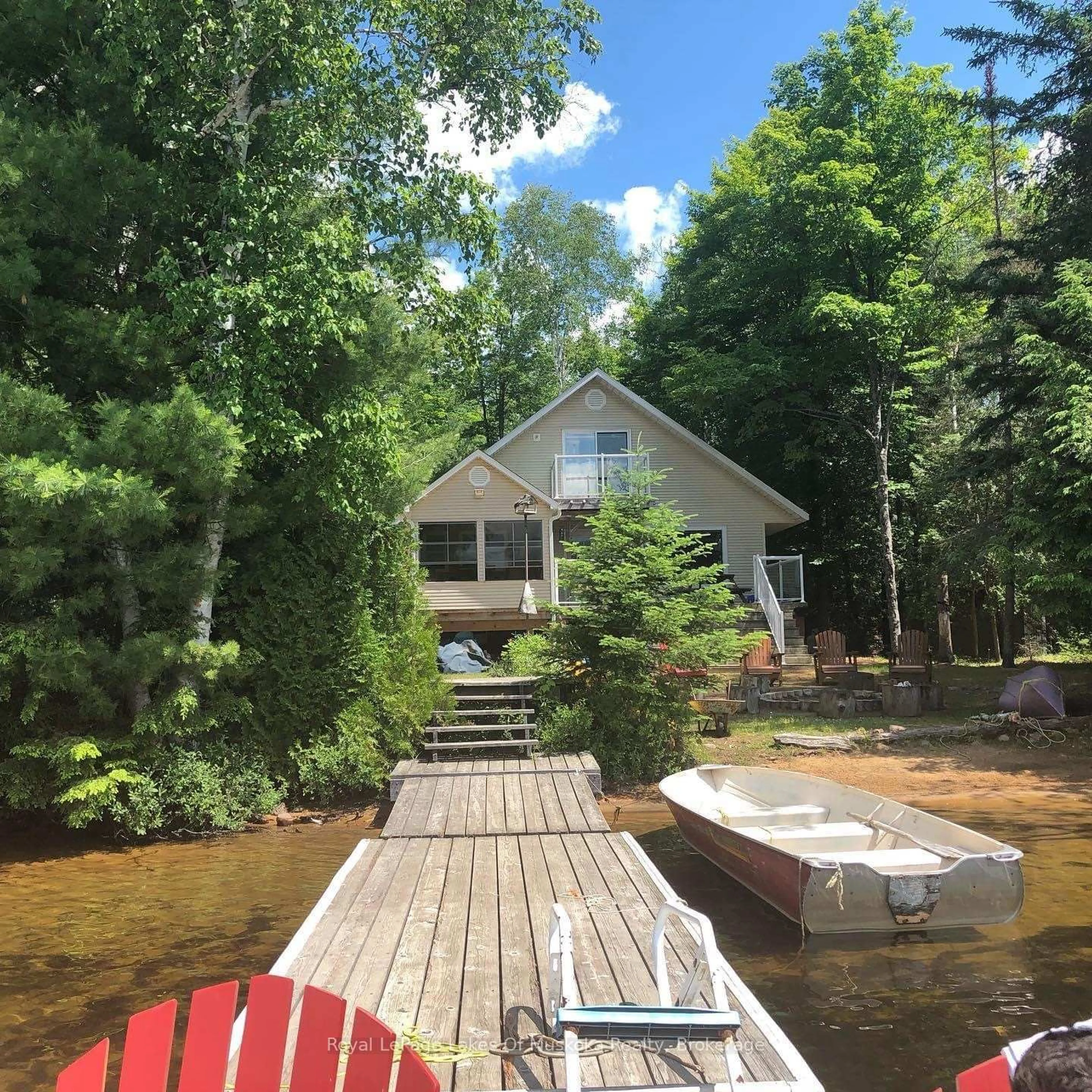 A pic from outside/outdoor area/front of a property/back of a property/a pic from drone, water/lake/river/ocean view for 1012 Goodlife Lane, Algonquin Highlands Ontario P0A 0A8