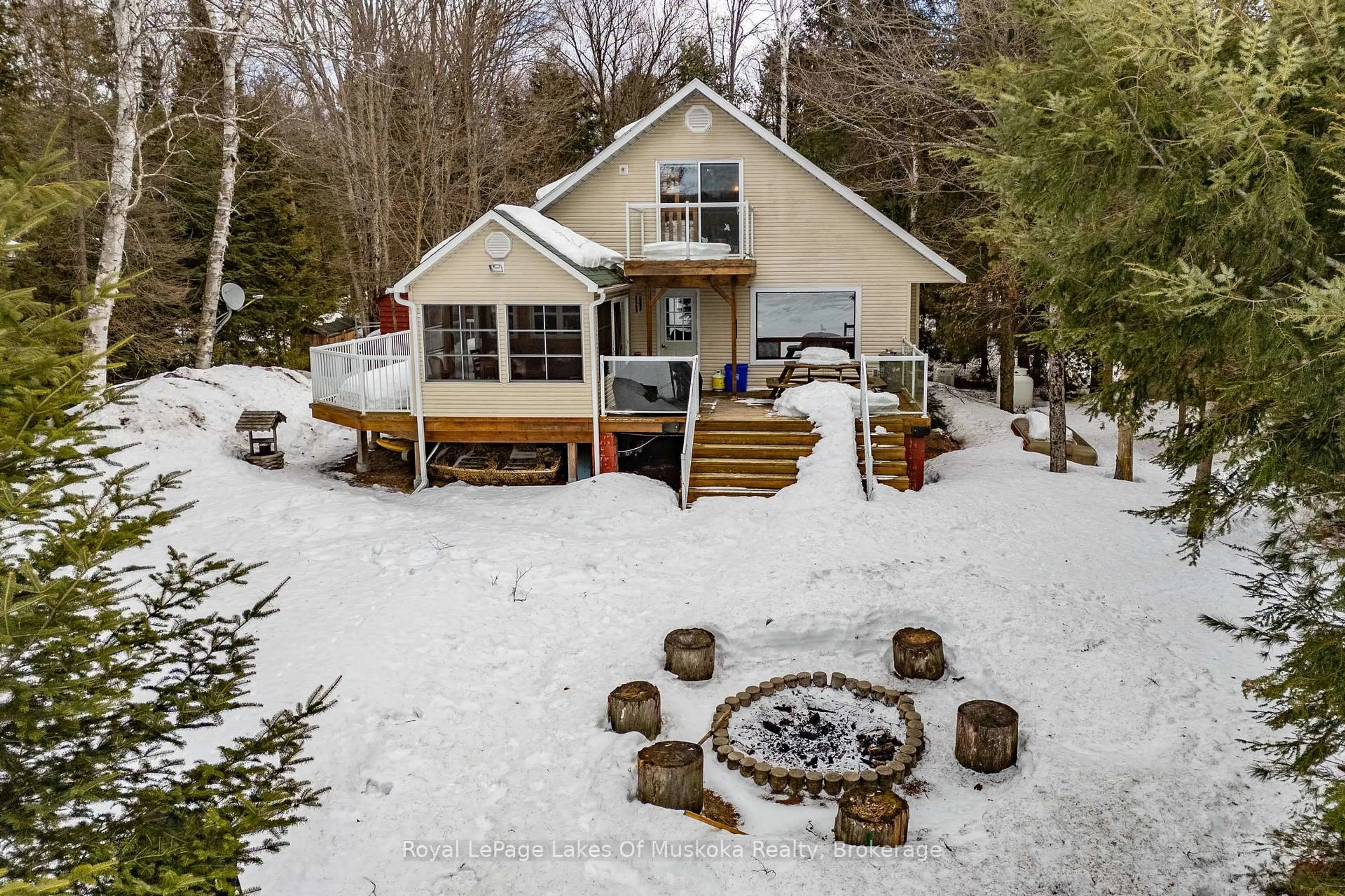A pic from outside/outdoor area/front of a property/back of a property/a pic from drone, water/lake/river/ocean view for 1012 Goodlife Lane, Algonquin Highlands Ontario P0A 0A8