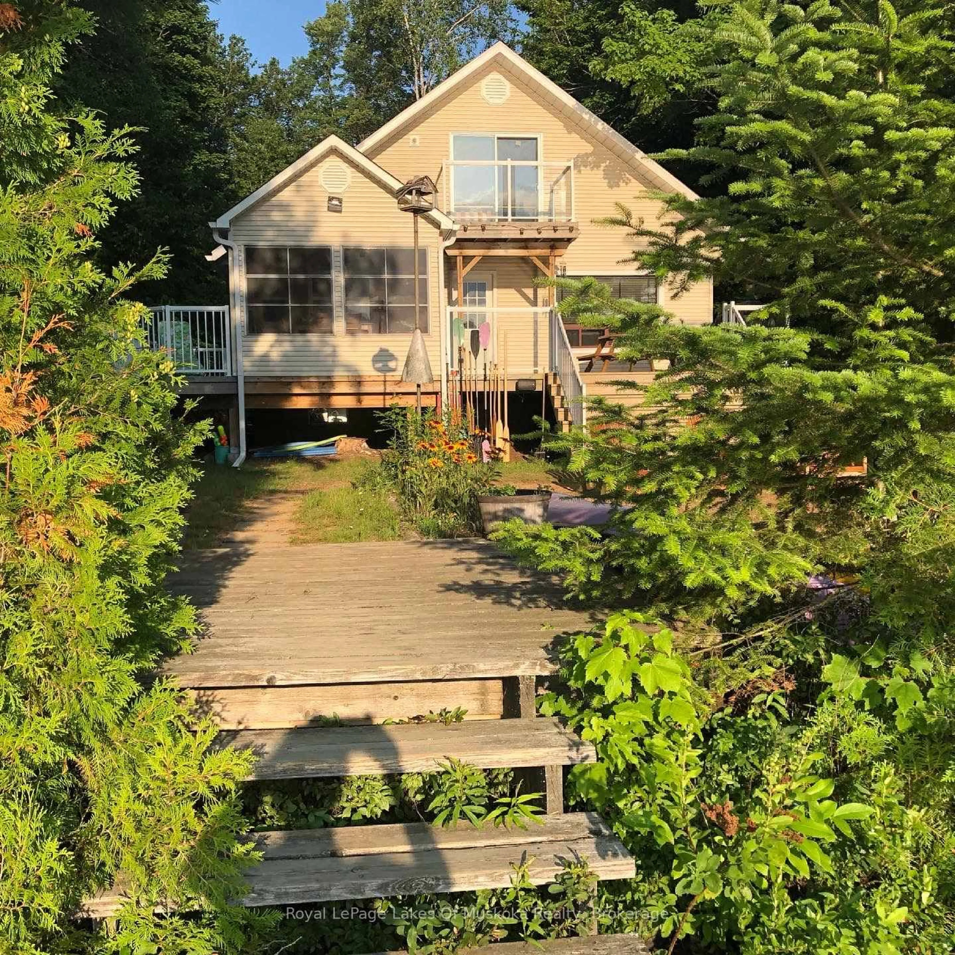 A pic from outside/outdoor area/front of a property/back of a property/a pic from drone, water/lake/river/ocean view for 1012 Goodlife Lane, Algonquin Highlands Ontario P0A 0A8