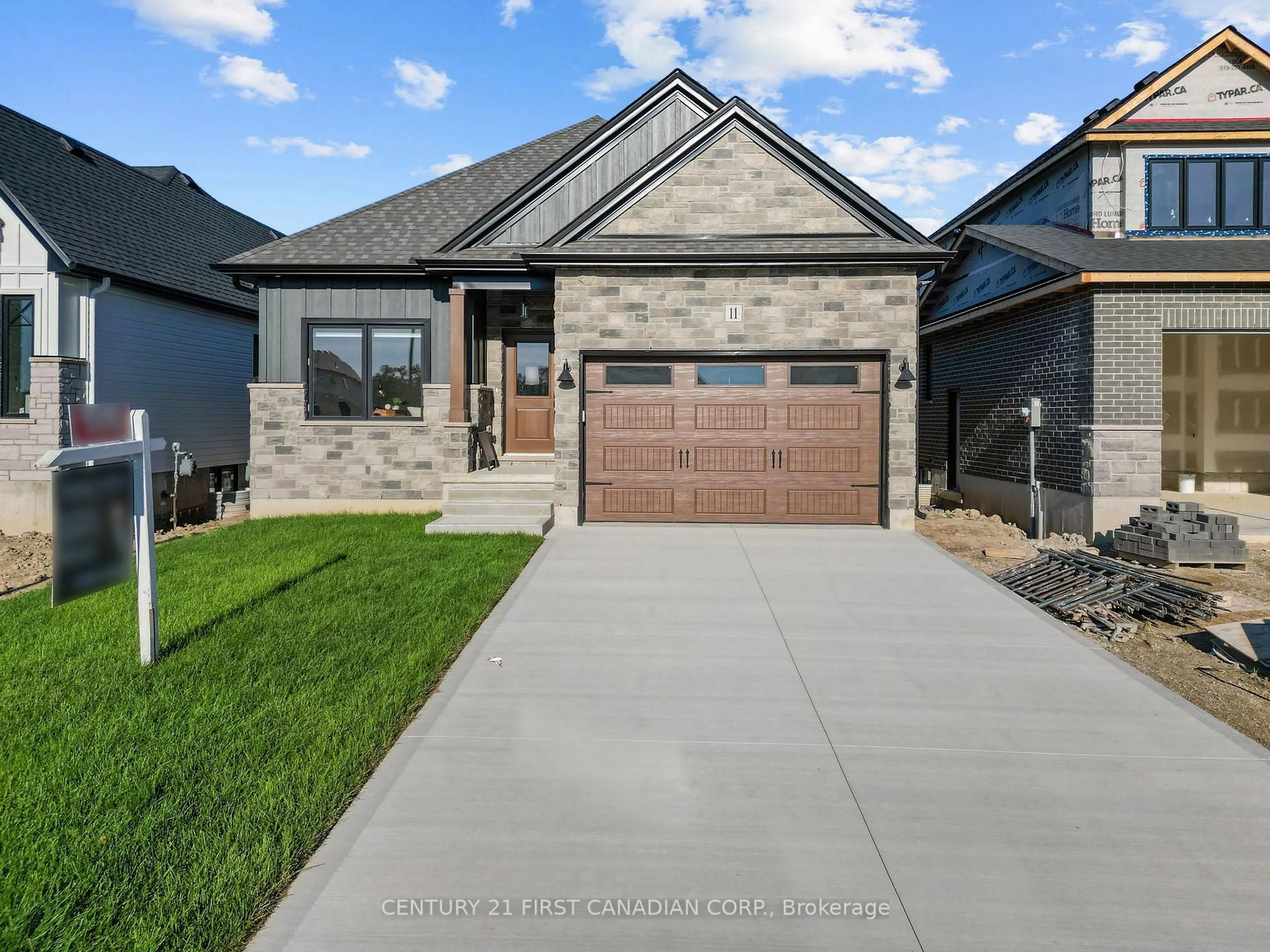 Home with brick exterior material, street for 11 Sheldabren St, North Middlesex Ontario N0M 1A0