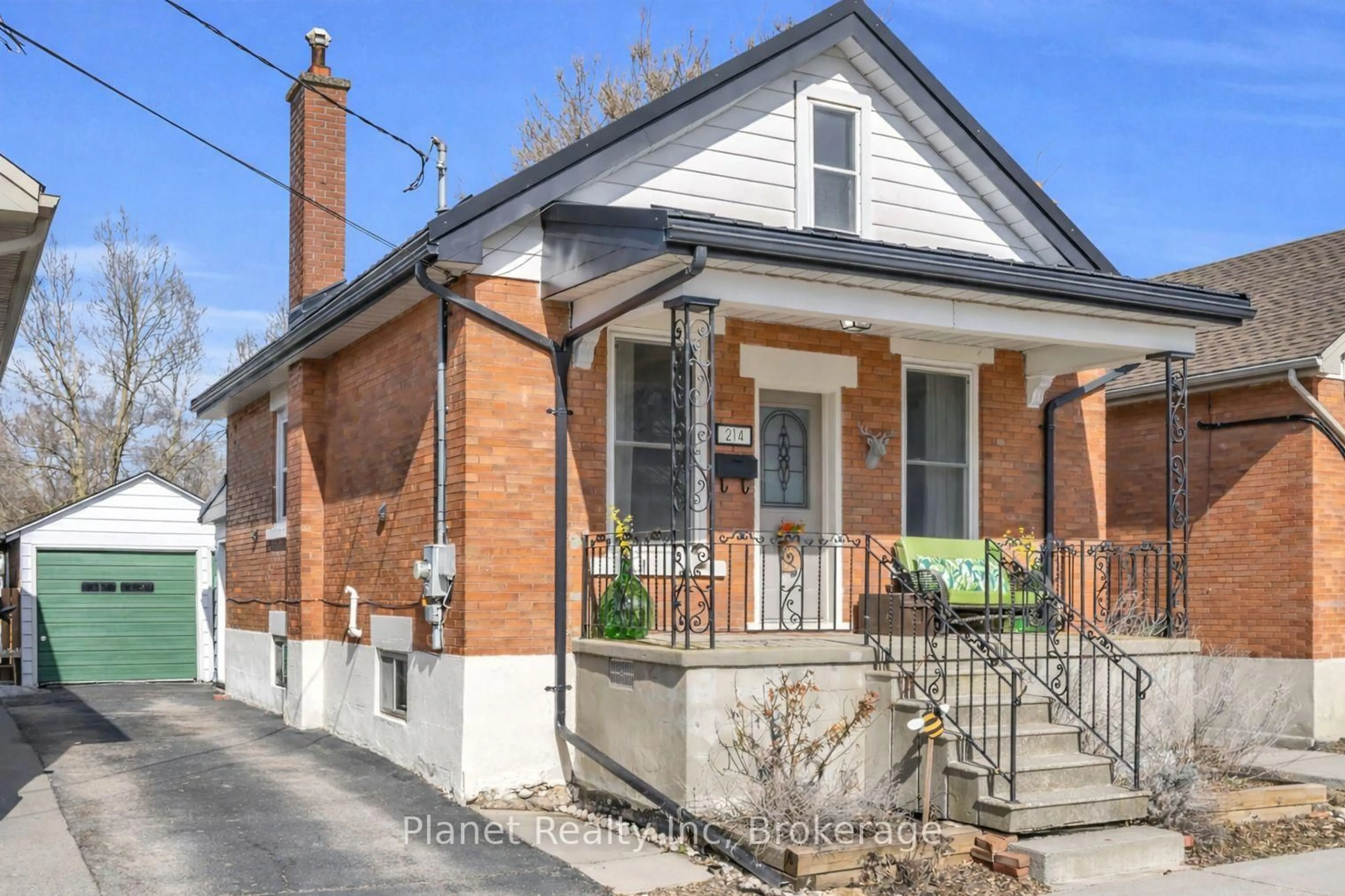 Home with brick exterior material, street for 214 Ferguson St, Guelph Ontario N1E 2Z3