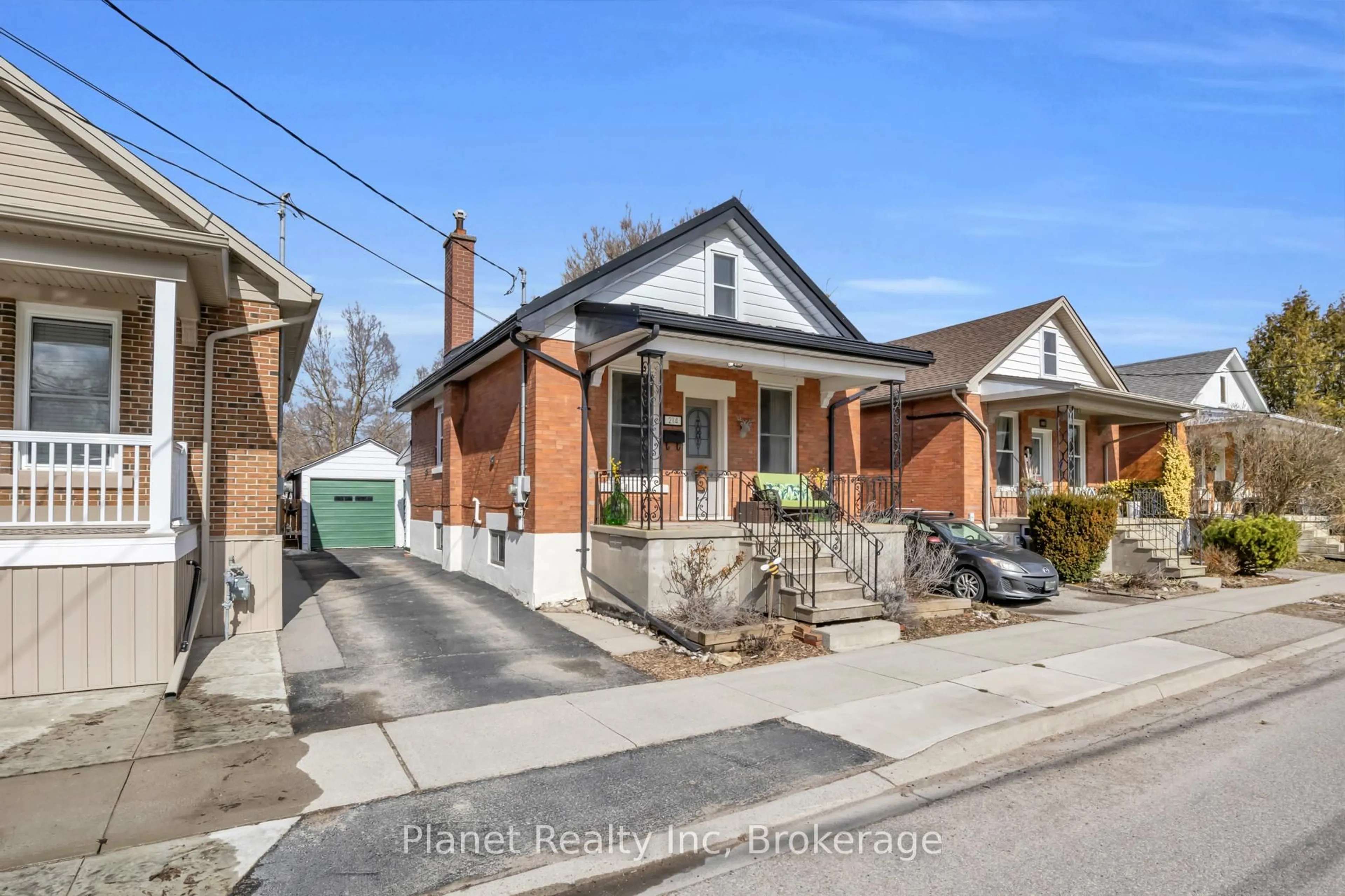 Home with brick exterior material, street for 214 Ferguson St, Guelph Ontario N1E 2Z3