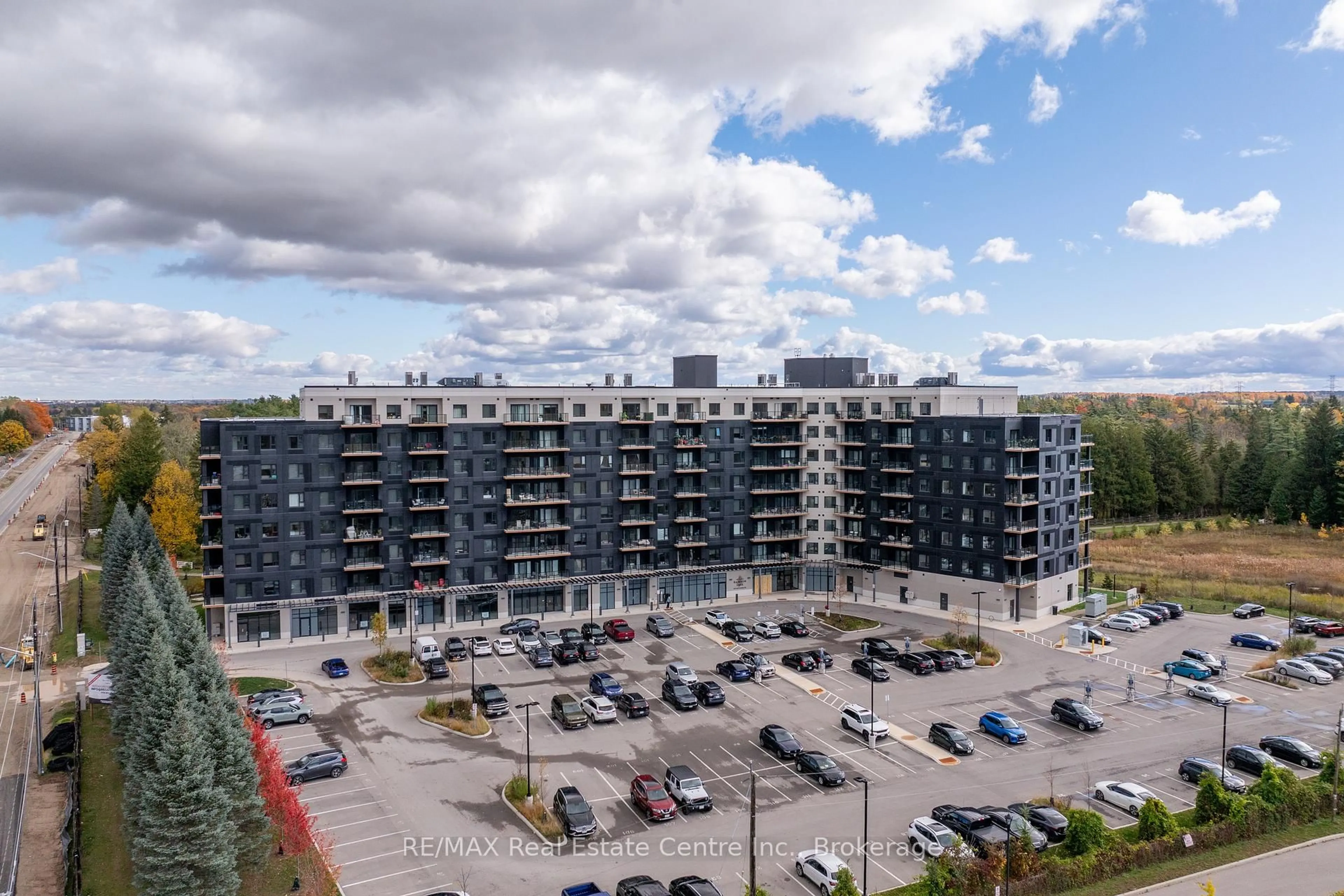 A pic from outside/outdoor area/front of a property/back of a property/a pic from drone, unknown for 525 New Dundee Rd #101, Kitchener Ontario N2P 0K8