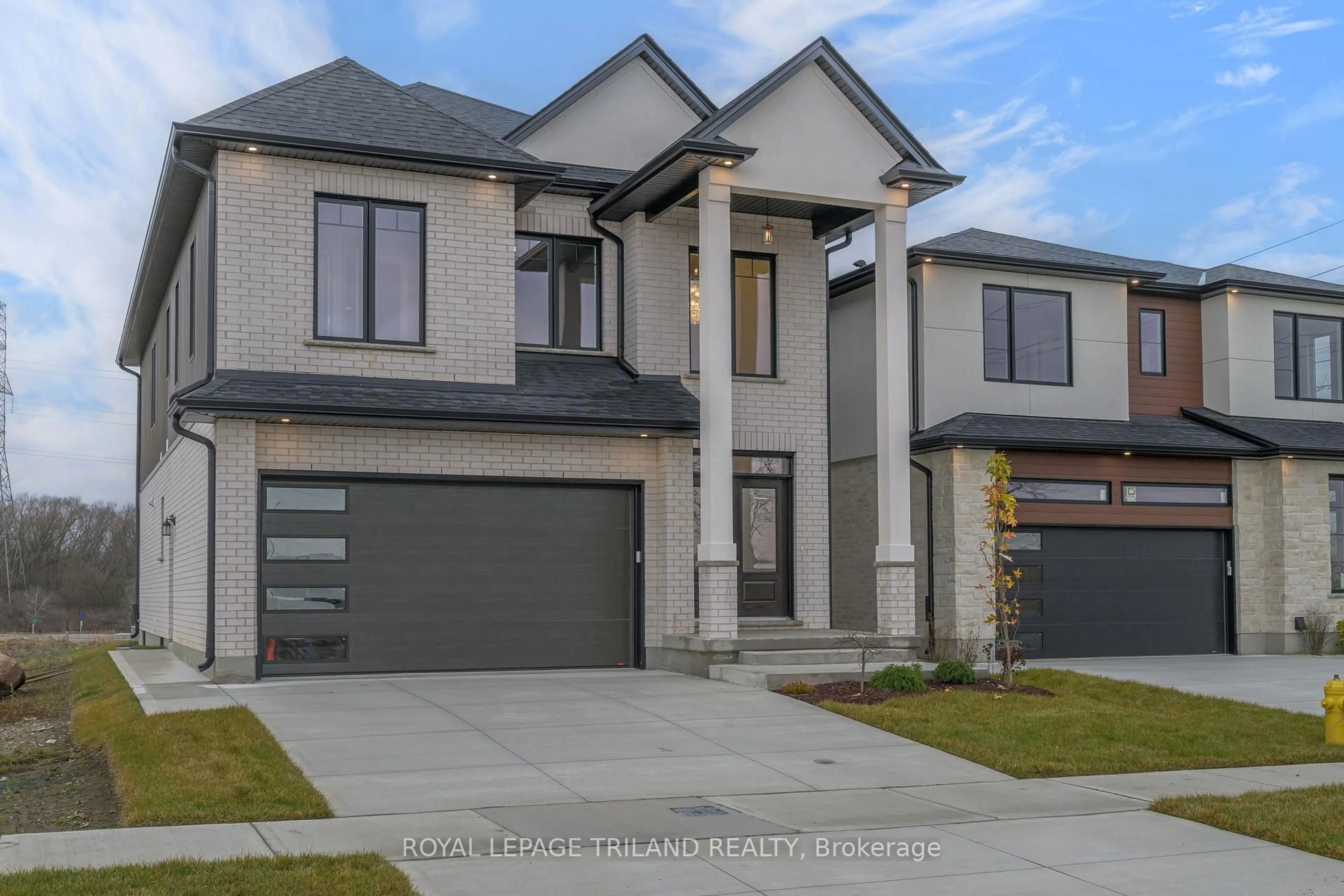 Home with brick exterior material, street for 4211 LIBERTY Crossing, London South Ontario N6P 0L1