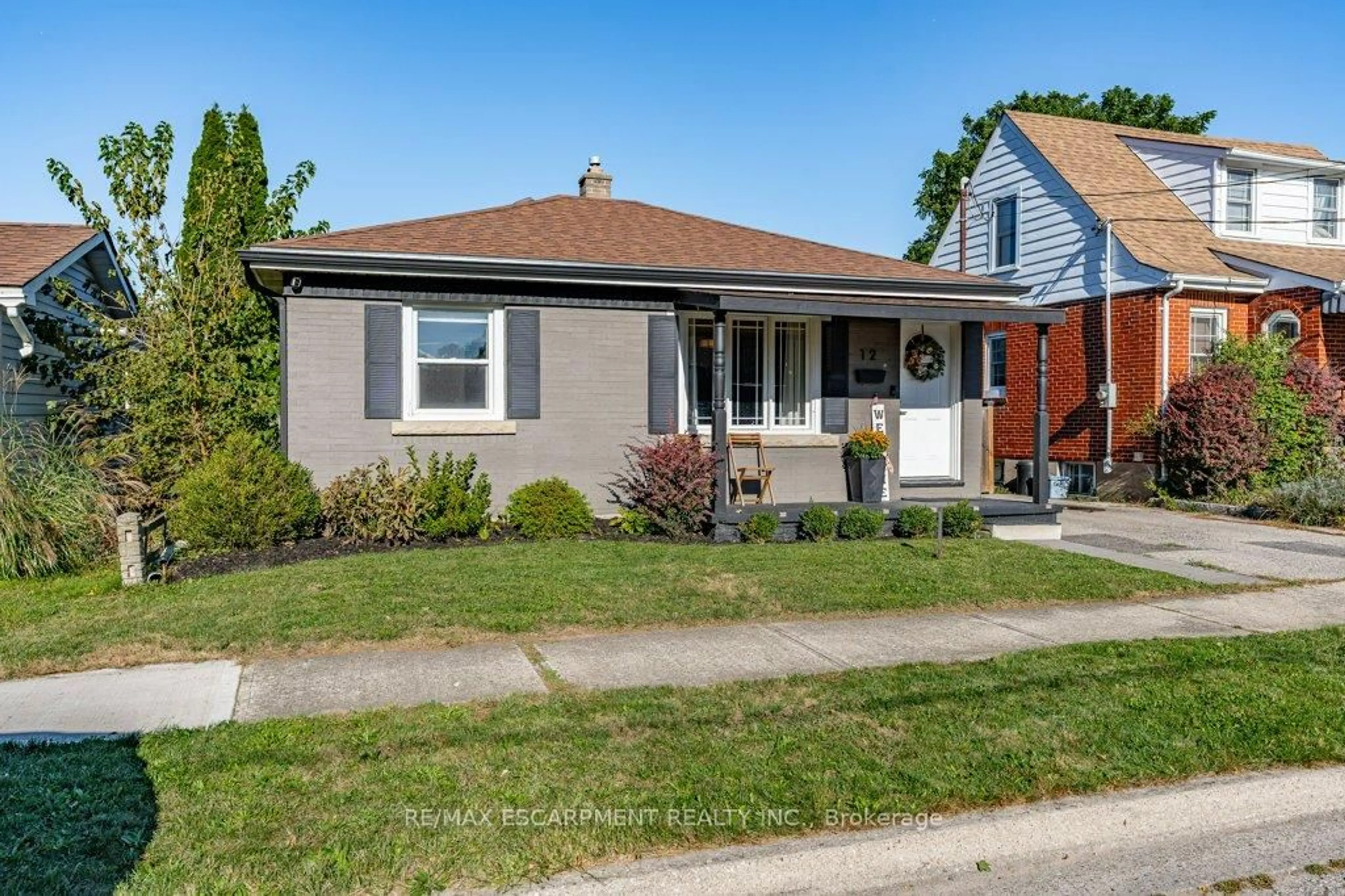 Home with brick exterior material, street for 12 Wade Ave, Brantford Ontario N3T 1W8