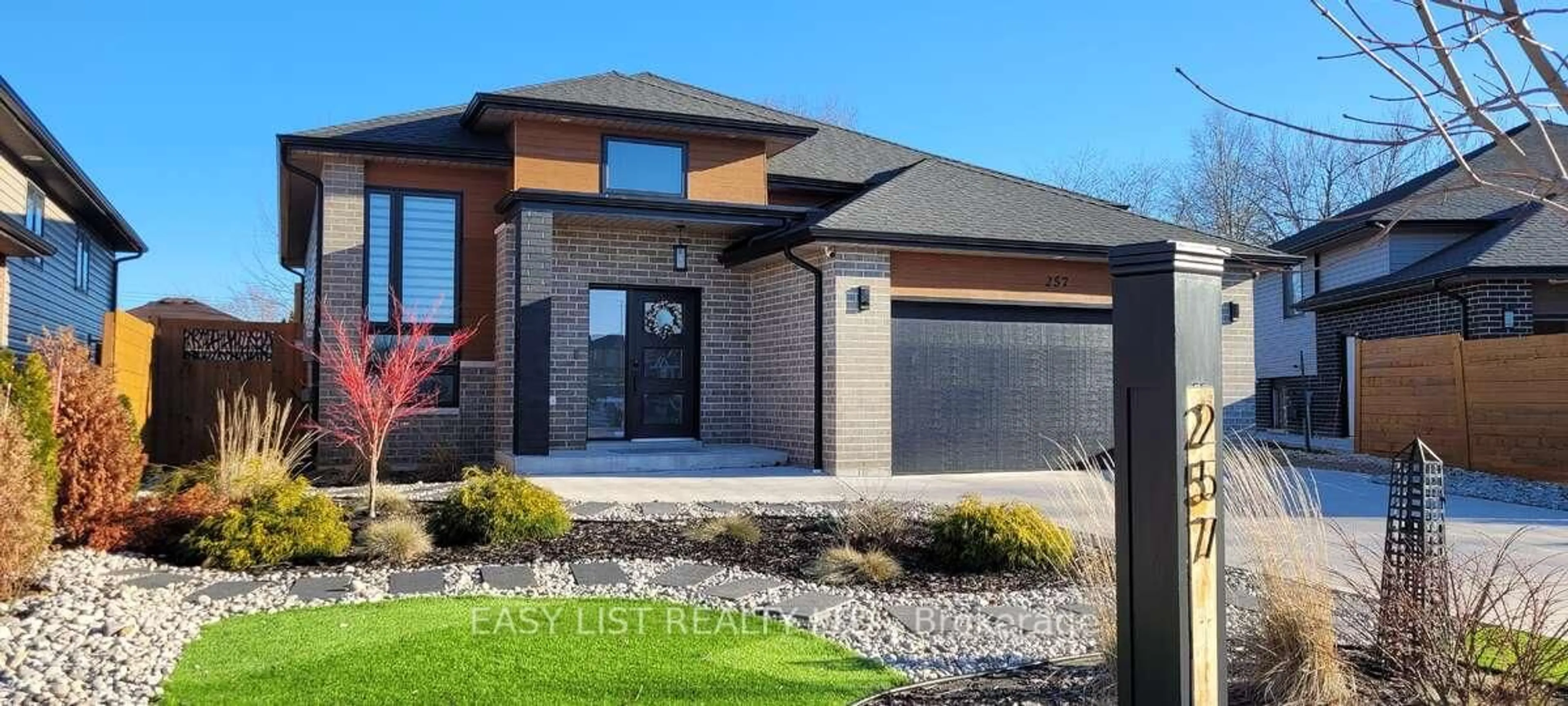 Home with brick exterior material, street for 257 Robinson Ave, Essex Ontario N8M 0A8