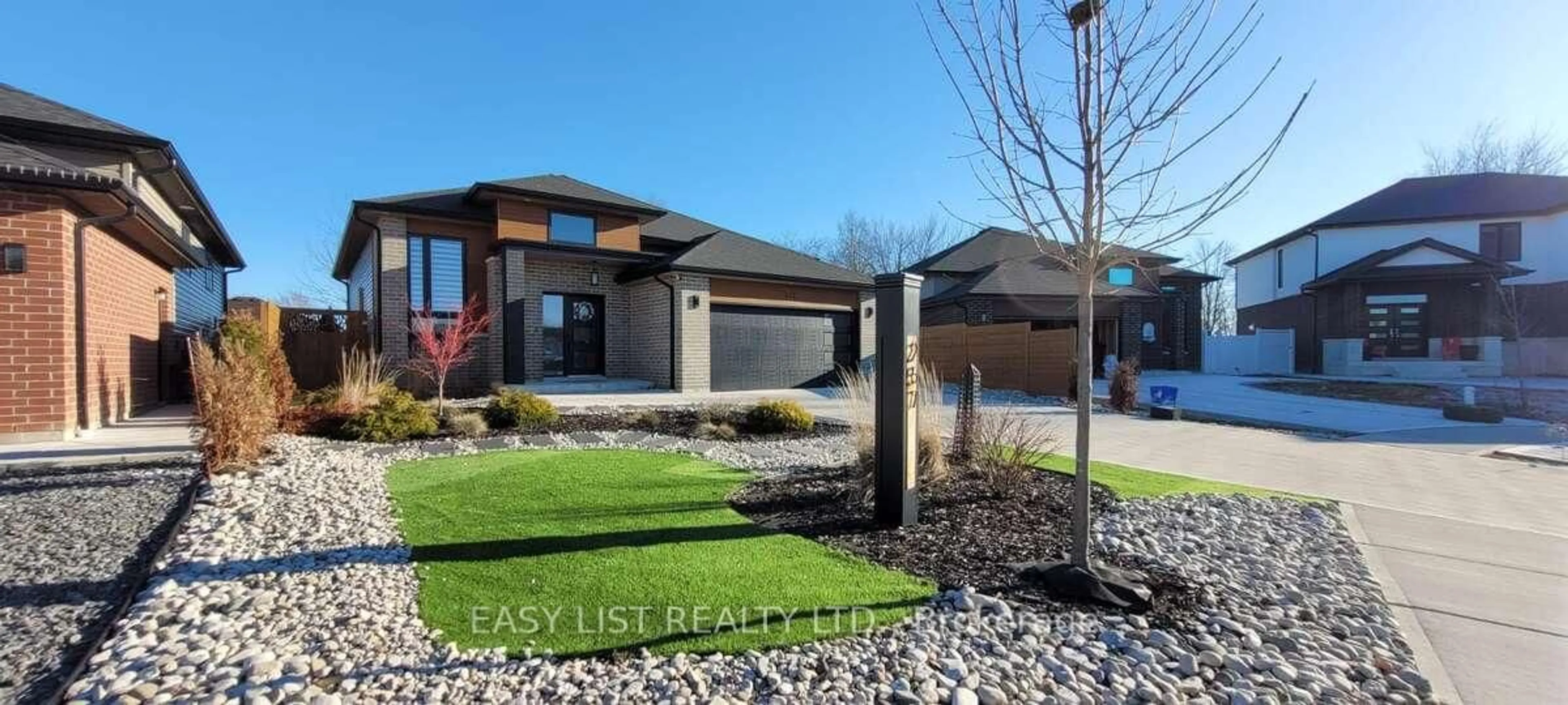 Home with brick exterior material, street for 257 Robinson Ave, Essex Ontario N8M 0A8