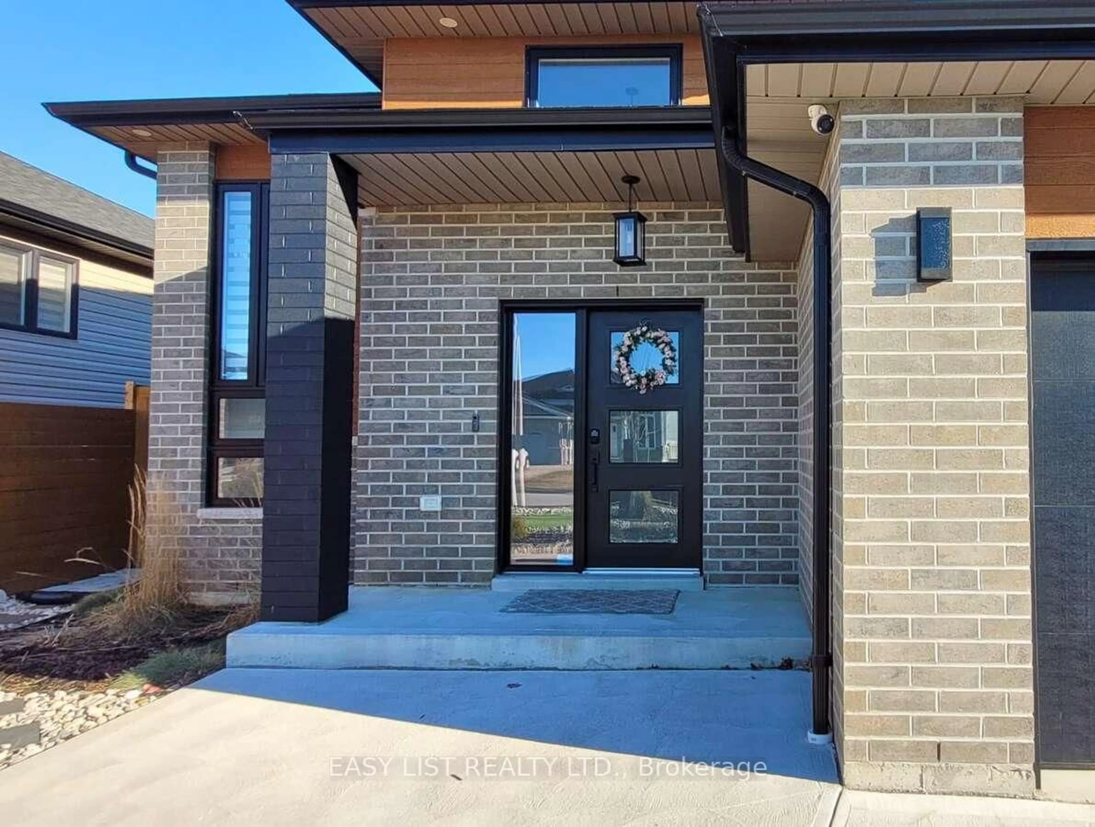 Home with brick exterior material, street for 257 Robinson Ave, Essex Ontario N8M 0A8