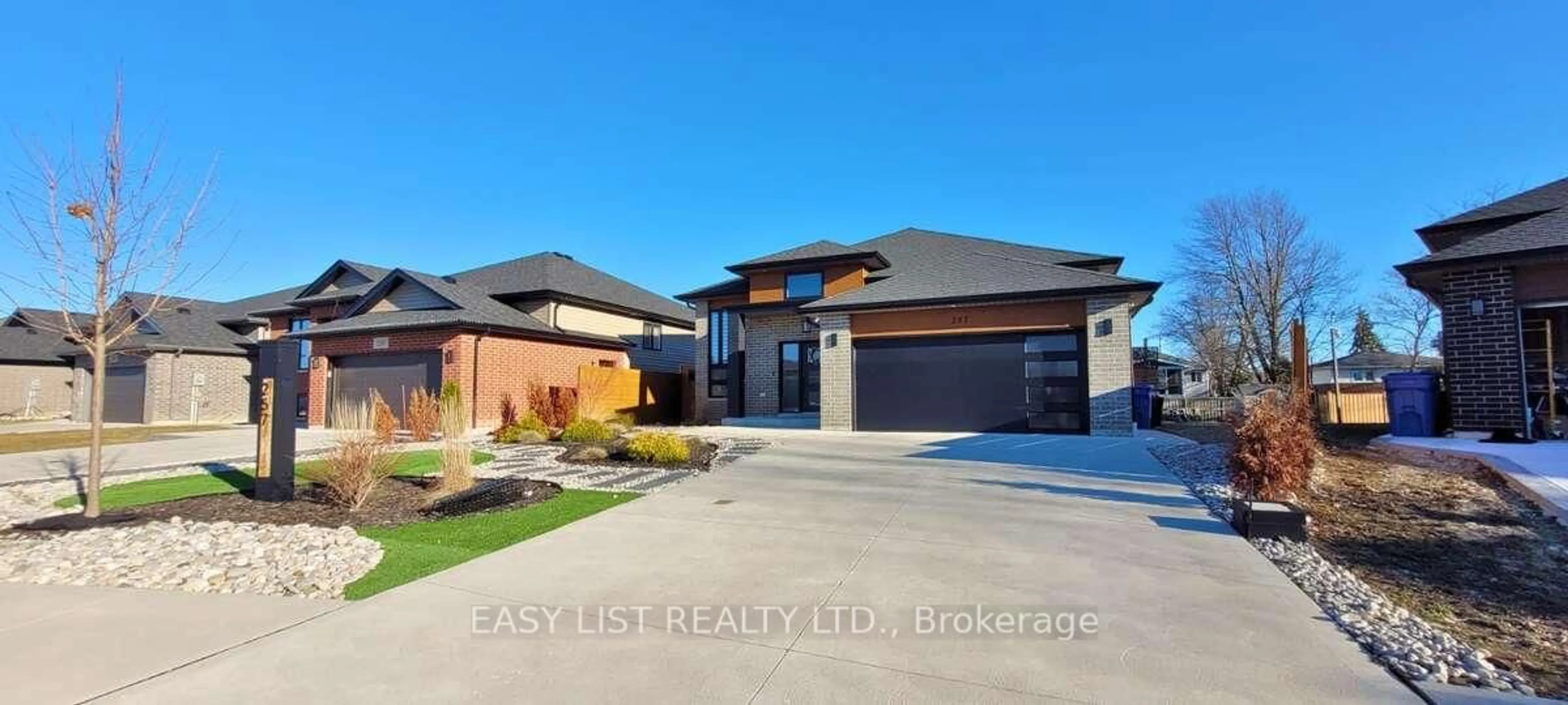 Home with brick exterior material, street for 257 Robinson Ave, Essex Ontario N8M 0A8