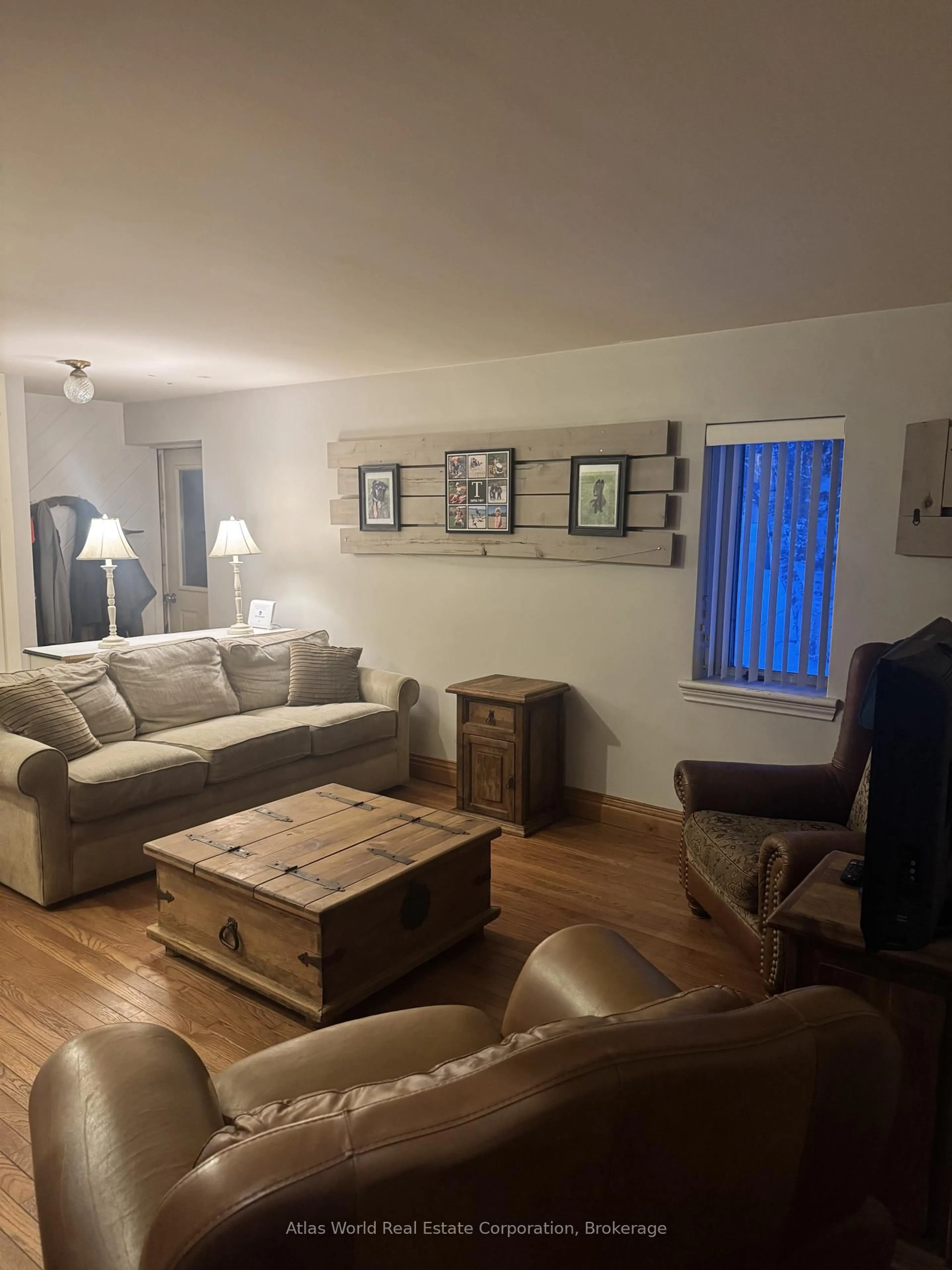 Living room with furniture, wood/laminate floor for 20 Point View Dr, Northern Bruce Peninsula Ontario N0H 1W0