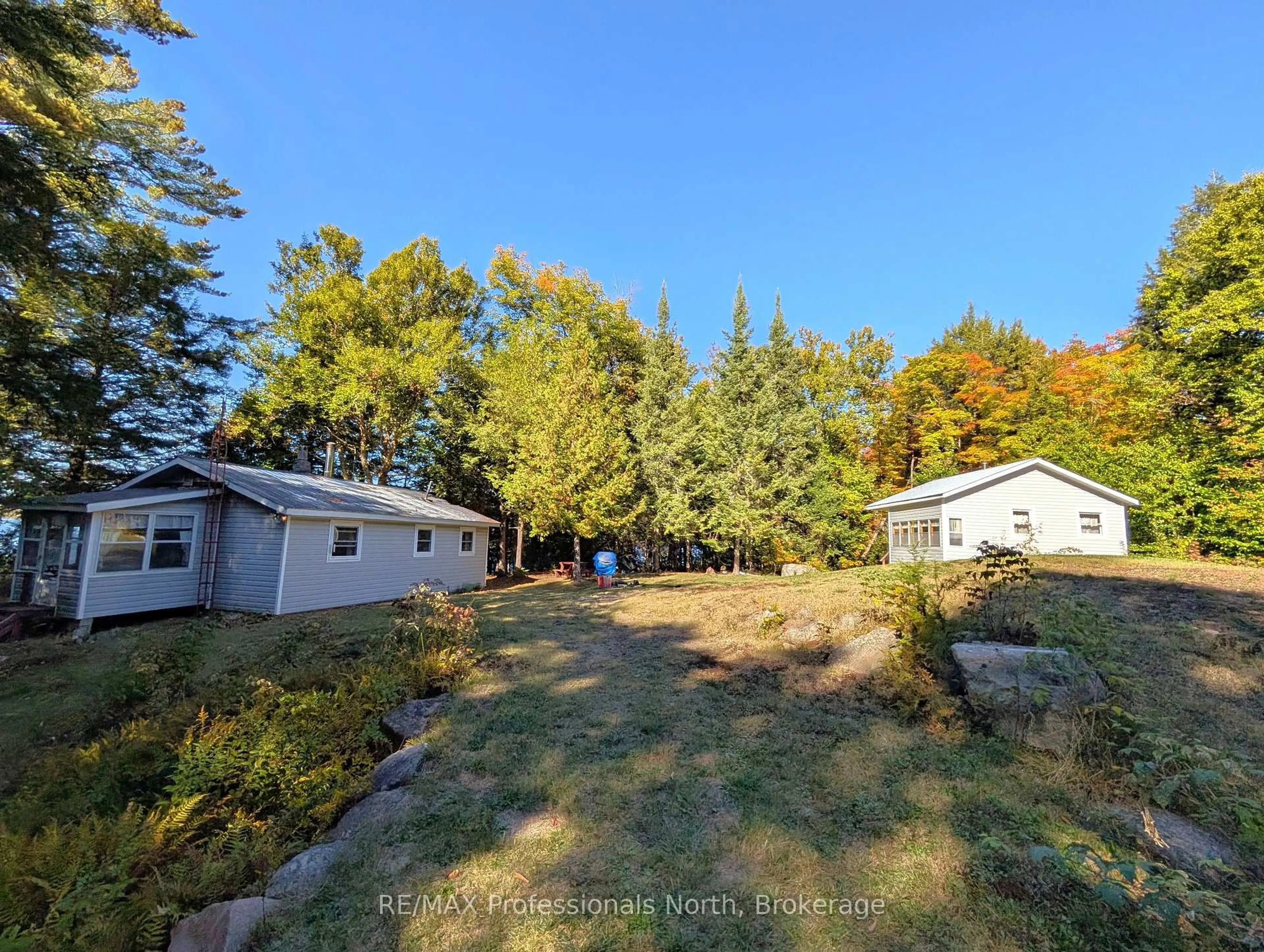 A pic from outside/outdoor area/front of a property/back of a property/a pic from drone, forest/trees view for 40 Centre Rd, Parry Sound Remote Area Ontario P0A 1X0
