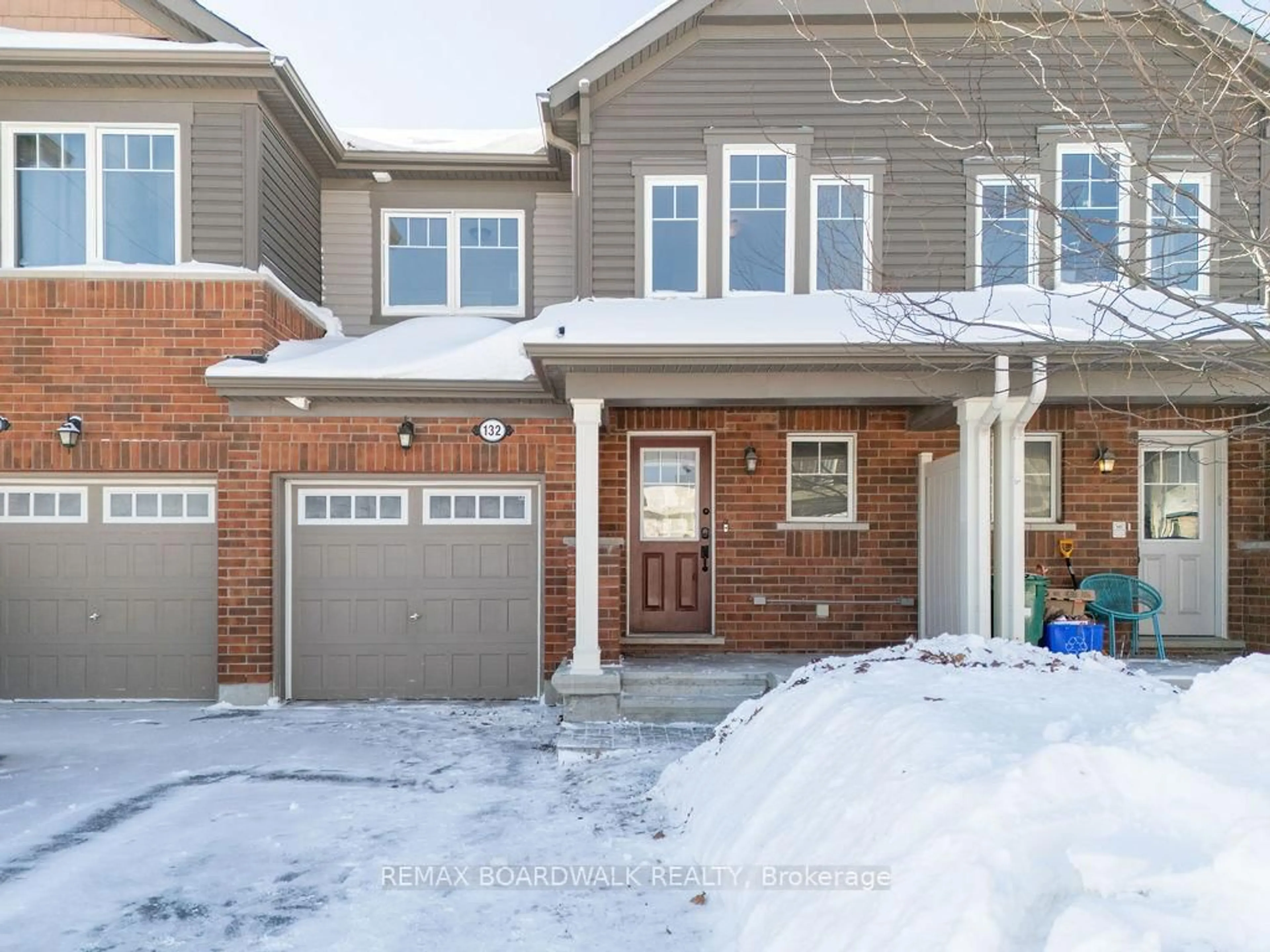 Home with brick exterior material, street for 132 Conifer Creek Circ, Ottawa Ontario K2M 0M2