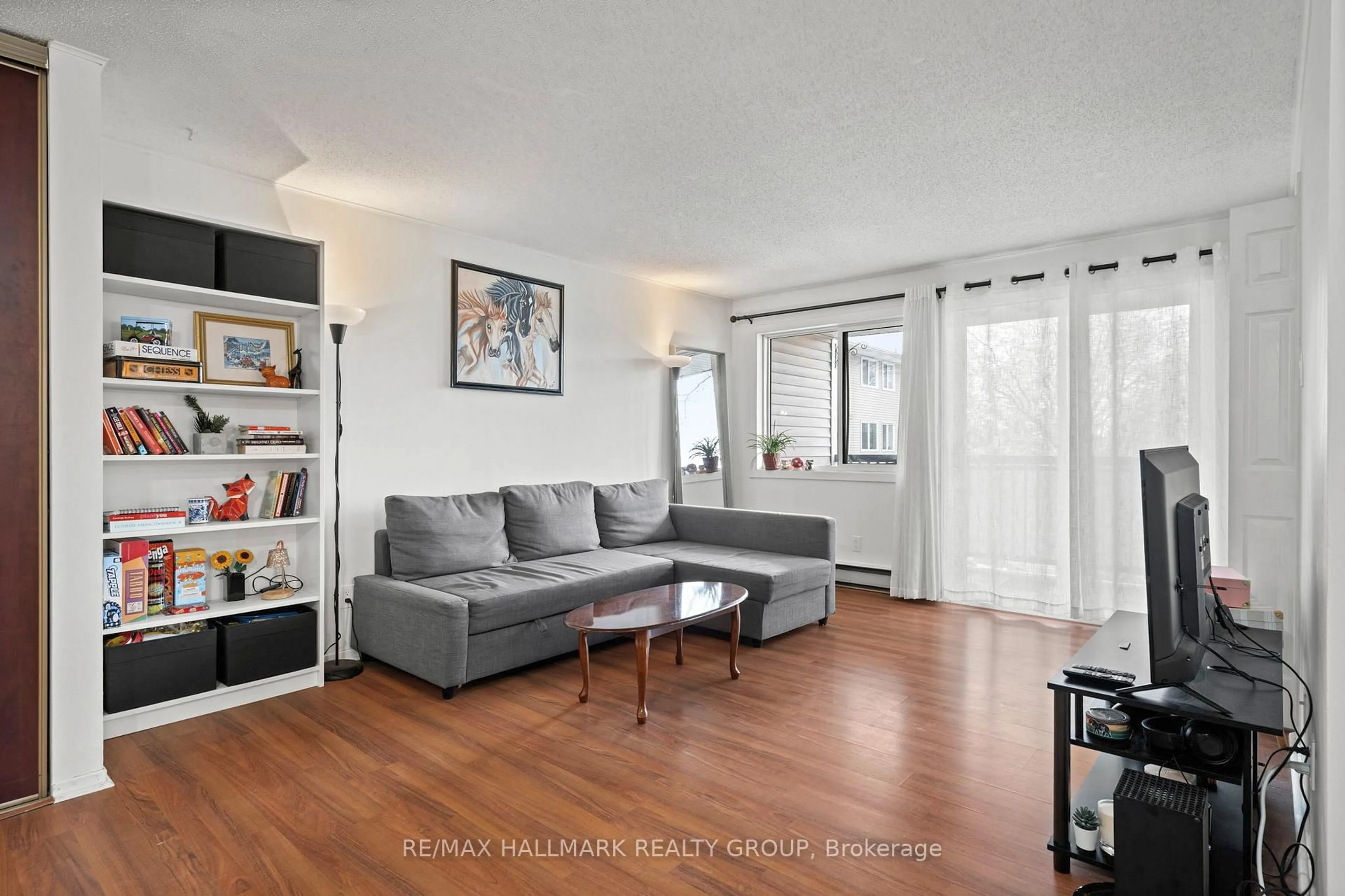 Living room with furniture, unknown for 6532 Bilberry Dr #315, Ottawa Ontario K1C 4N9