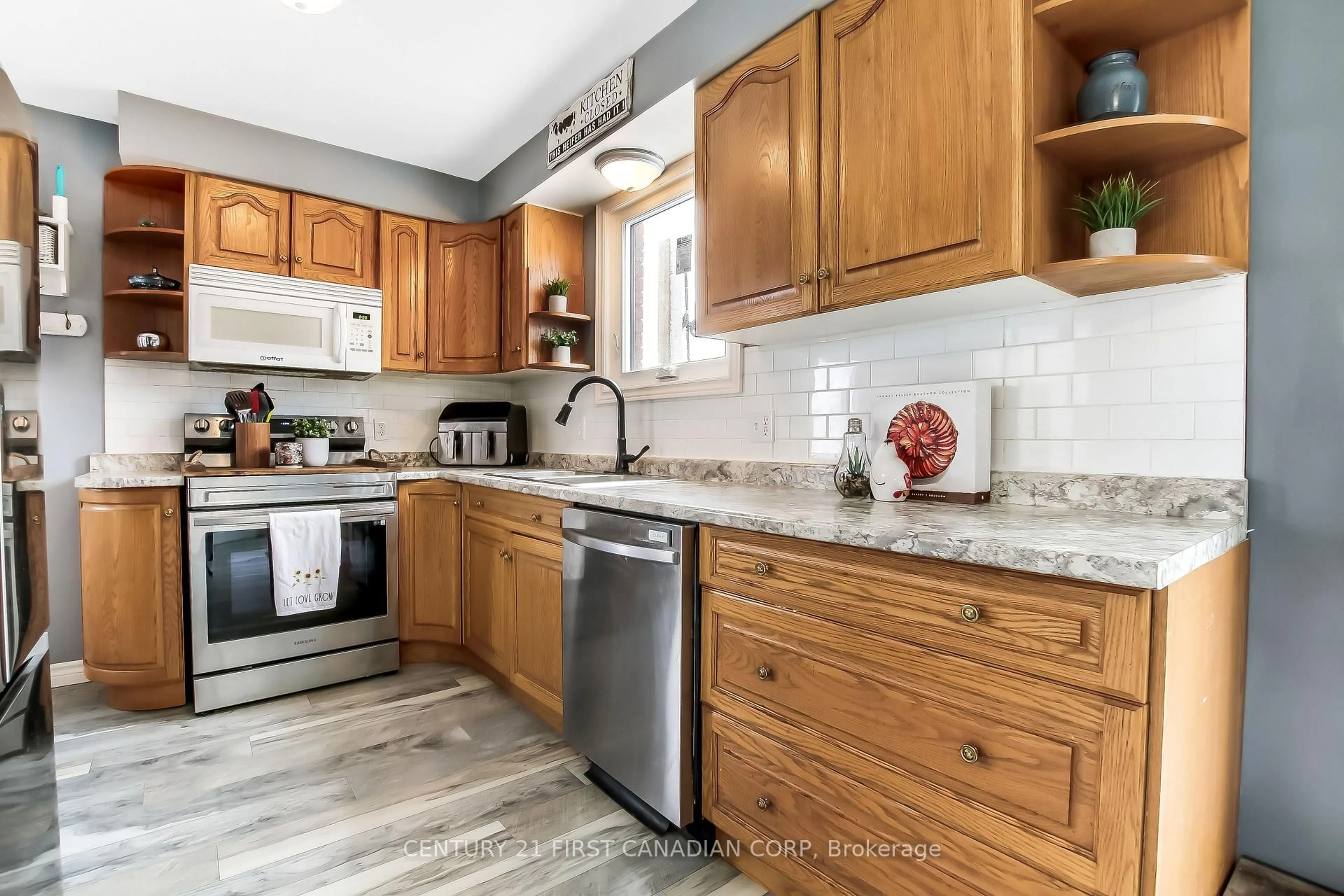 Open concept kitchen, ceramic/tile floor for 111B Symes St, Southwest Middlesex Ontario N0L 1M0