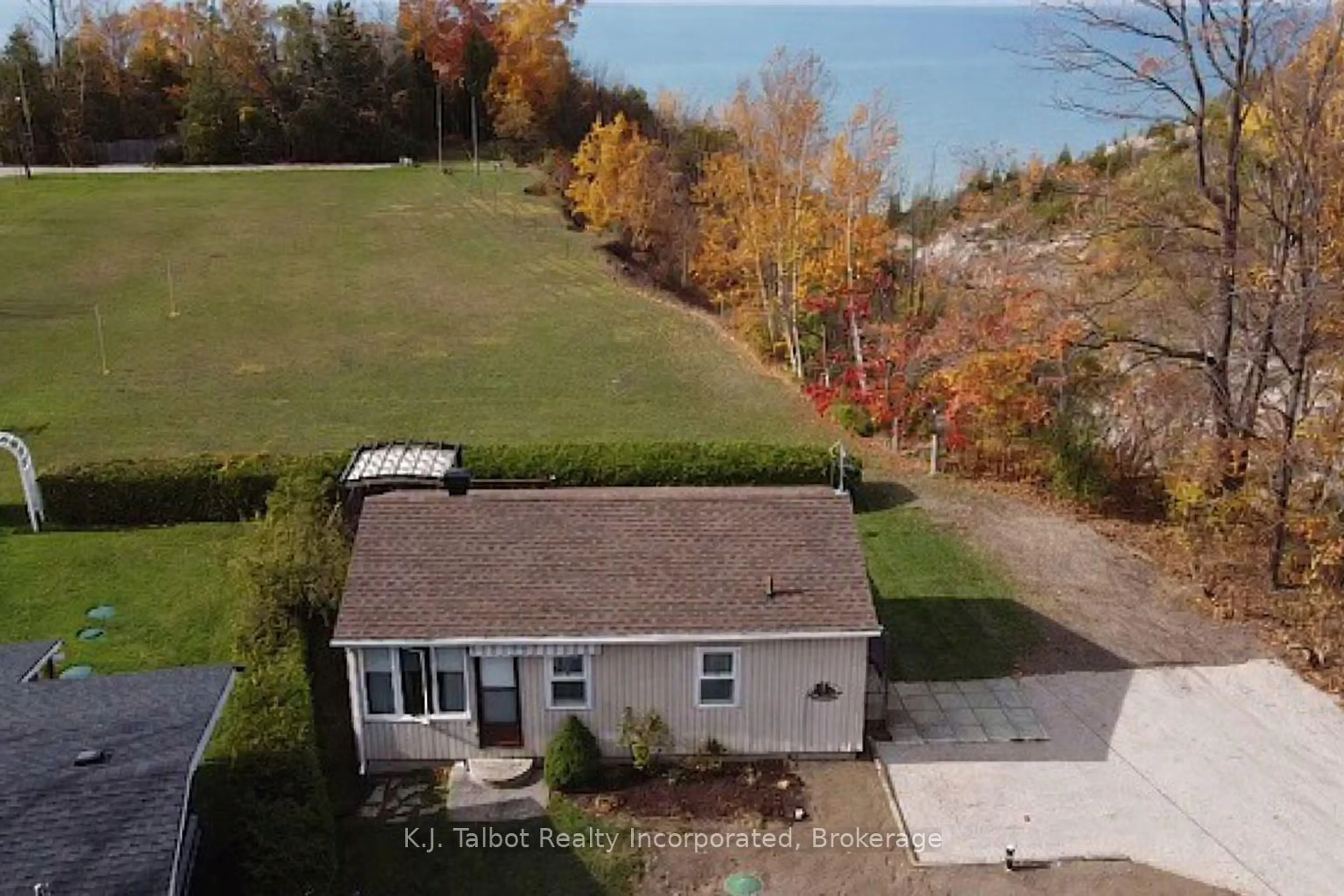 A pic from outside/outdoor area/front of a property/back of a property/a pic from drone, water/lake/river/ocean view for 9 Ravine Park Rd, Central Huron Ontario N7A 3X8