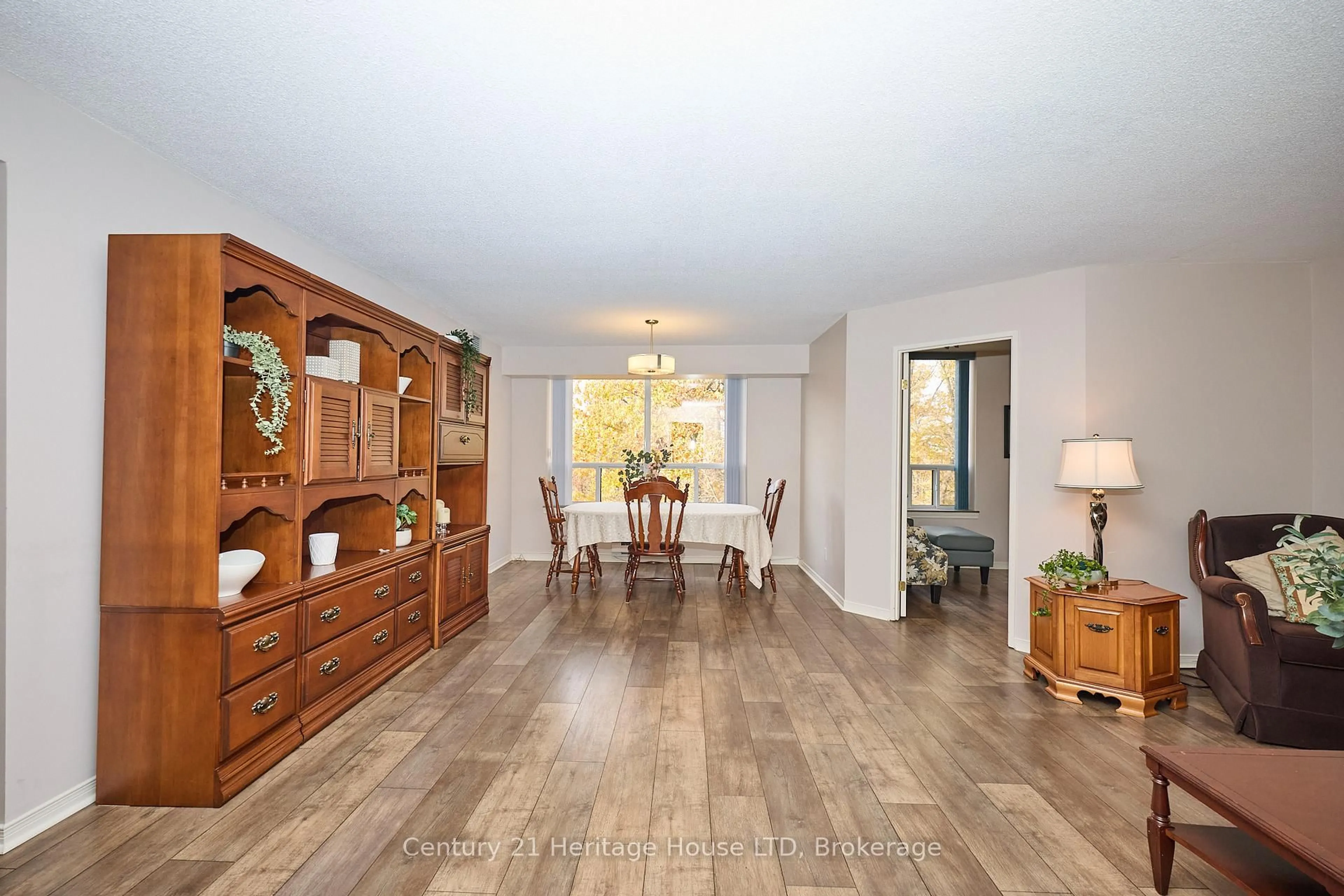 Dining room, wood/laminate floor for 8111 Forest Glen Dr #317, Niagara Falls Ontario L2H 2Y7
