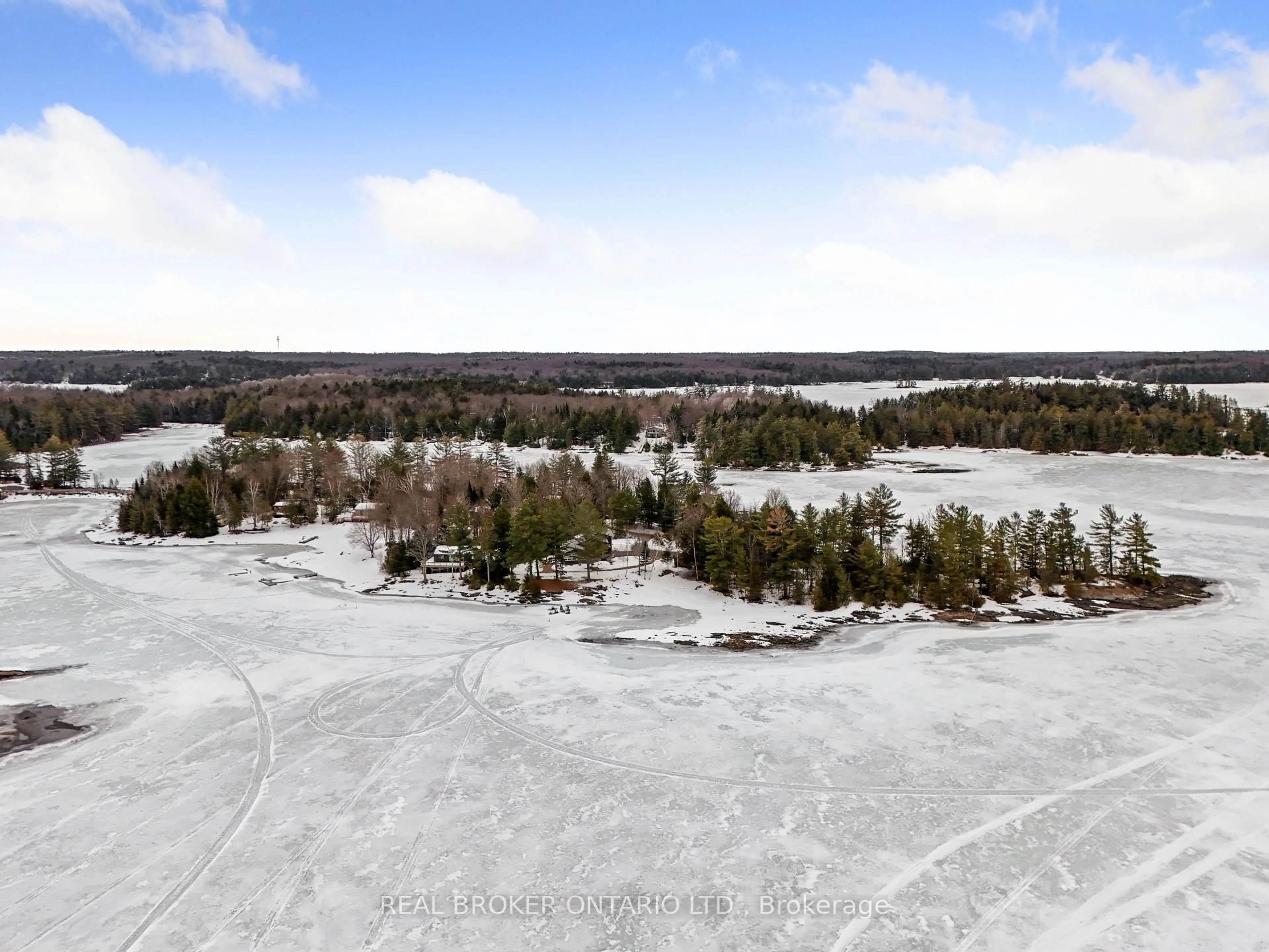 A pic from outside/outdoor area/front of a property/back of a property/a pic from drone, water/lake/river/ocean view for 1109 Wilderness Island Tr, Highlands East Ontario K0L 1C0