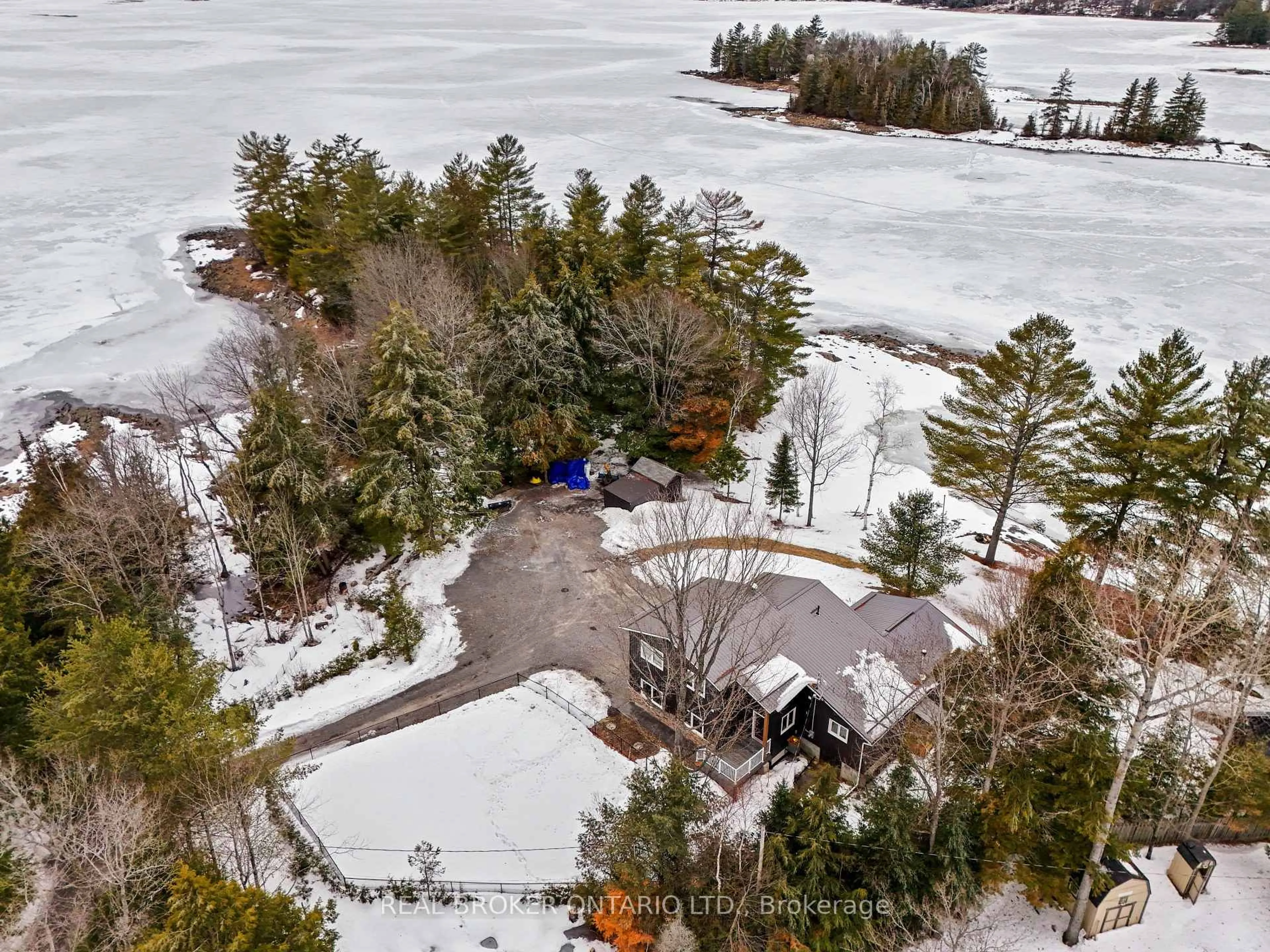 A pic from outside/outdoor area/front of a property/back of a property/a pic from drone, water/lake/river/ocean view for 1109 Wilderness Island Tr, Highlands East Ontario K0L 1C0