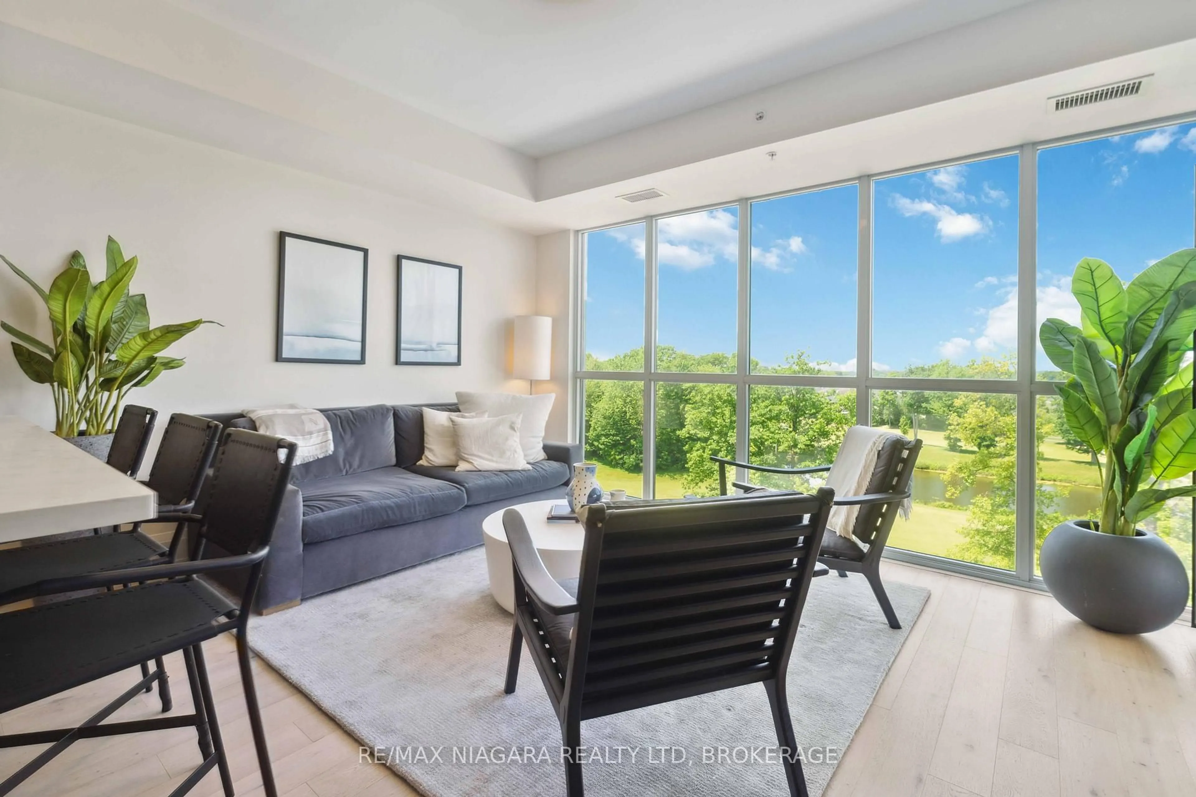 Living room with furniture, unknown for 7711 Green vista Gate #601, Niagara Falls Ontario L2H 1R1