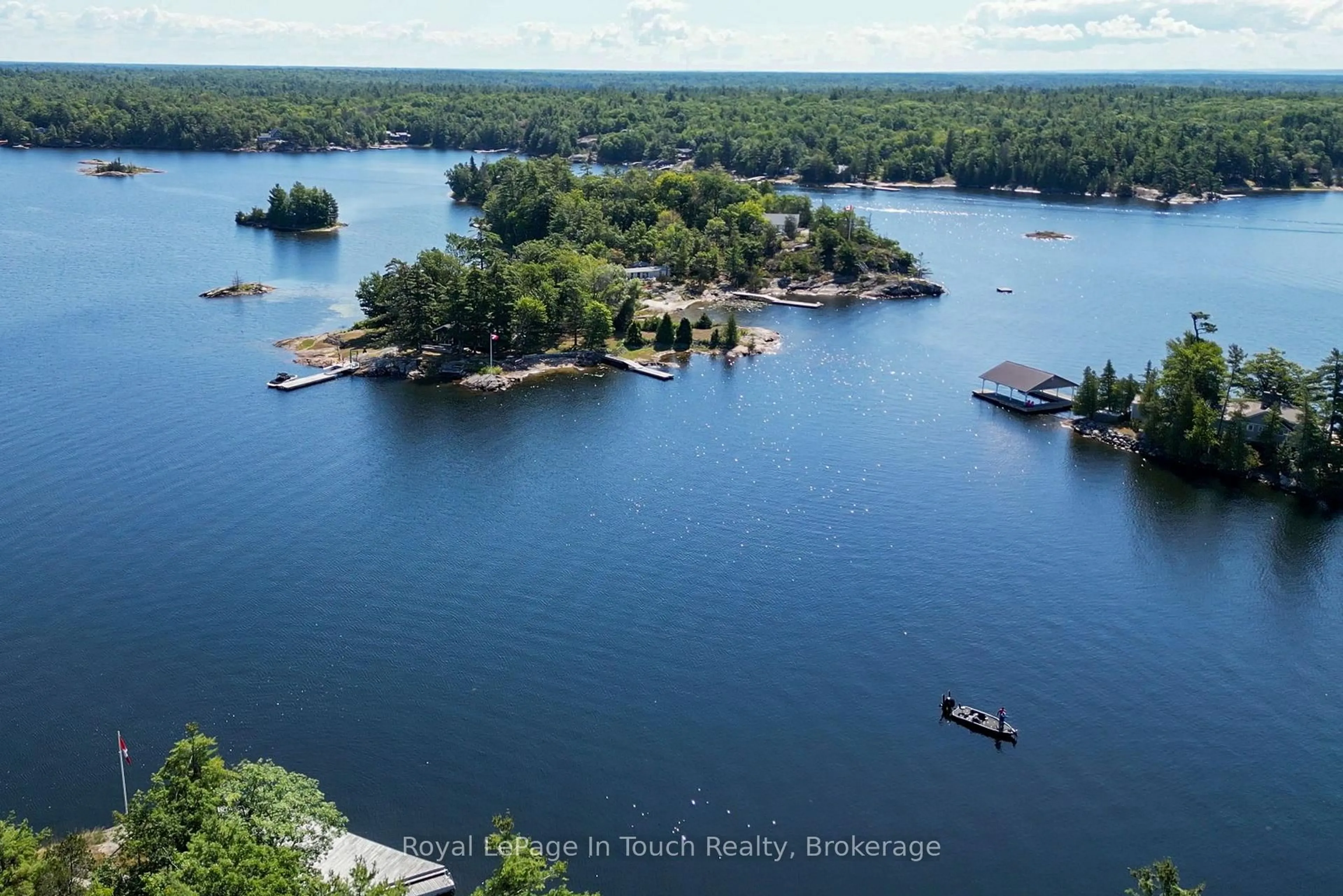 A pic from outside/outdoor area/front of a property/back of a property/a pic from drone, water/lake/river/ocean view for 13182 Georgian Bay Shore, Georgian Bay Ontario P0E 1E0