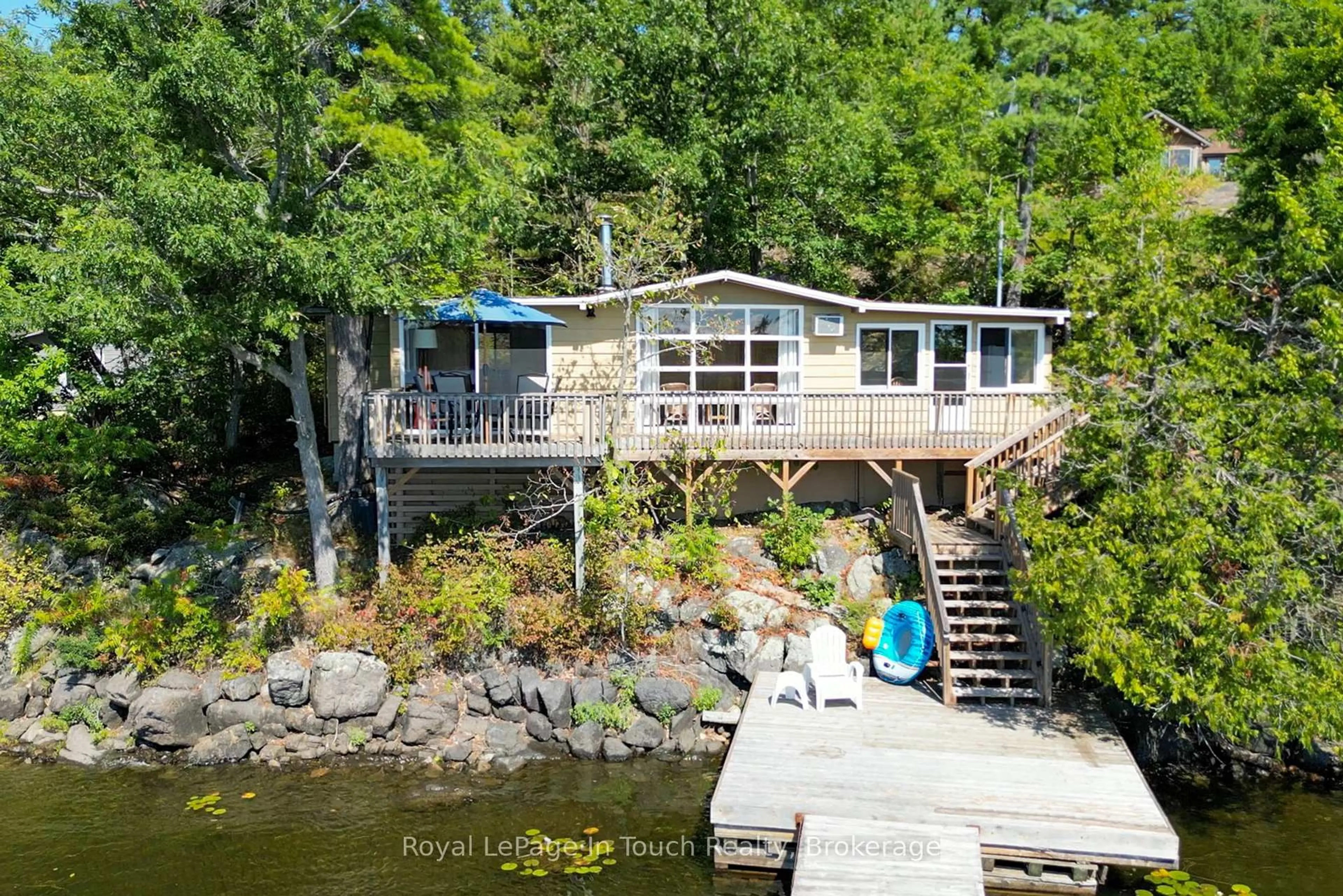 A pic from outside/outdoor area/front of a property/back of a property/a pic from drone, water/lake/river/ocean view for 13182 Georgian Bay Shore, Georgian Bay Ontario P0E 1E0