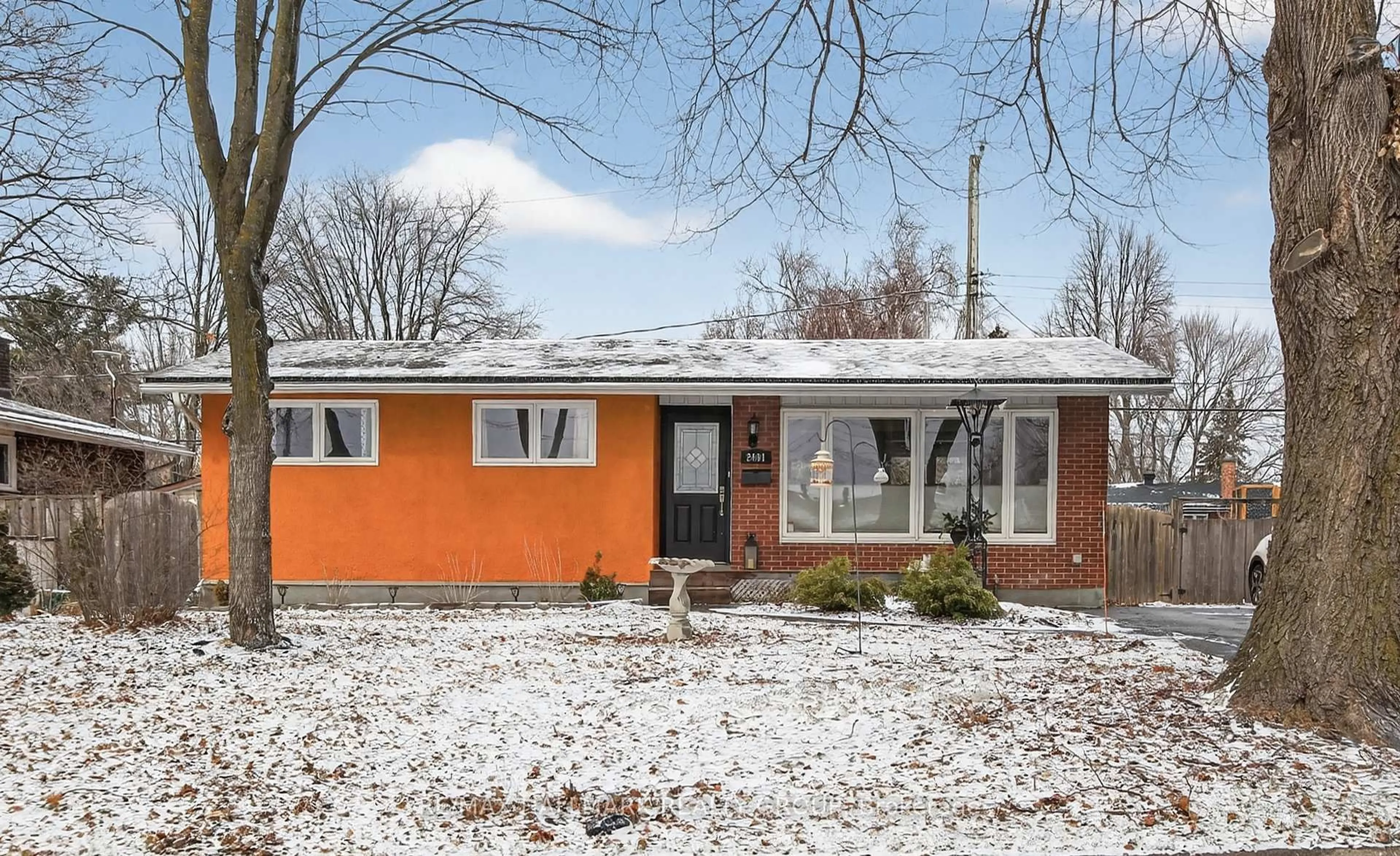 Home with brick exterior material, street for 2401 Magnus Ave, Ottawa Ontario K1G 1J7