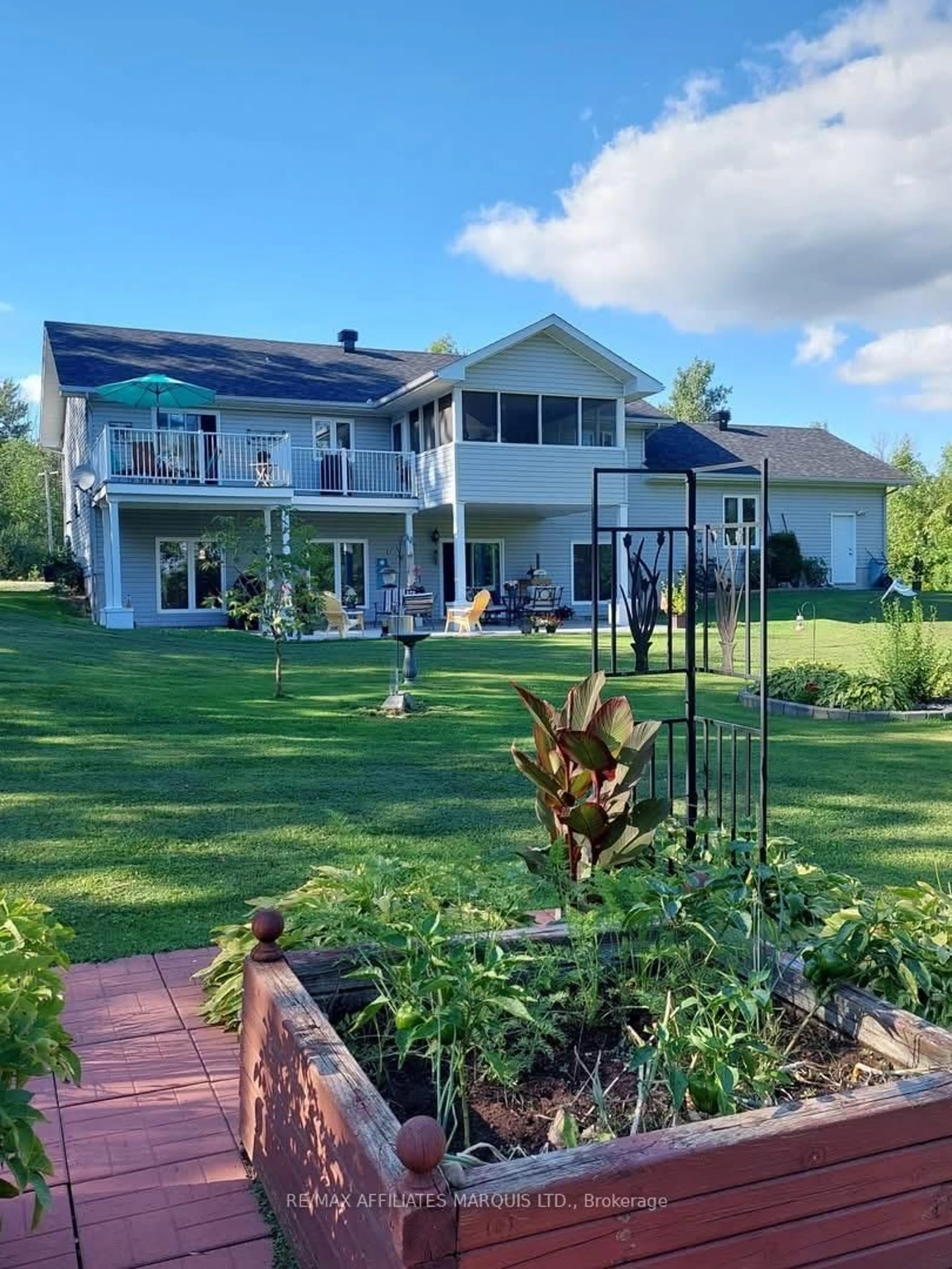 A pic from outside/outdoor area/front of a property/back of a property/a pic from drone, water/lake/river/ocean view for 16610 County Rd 36 Rd, South Stormont Ontario K0C 1P0