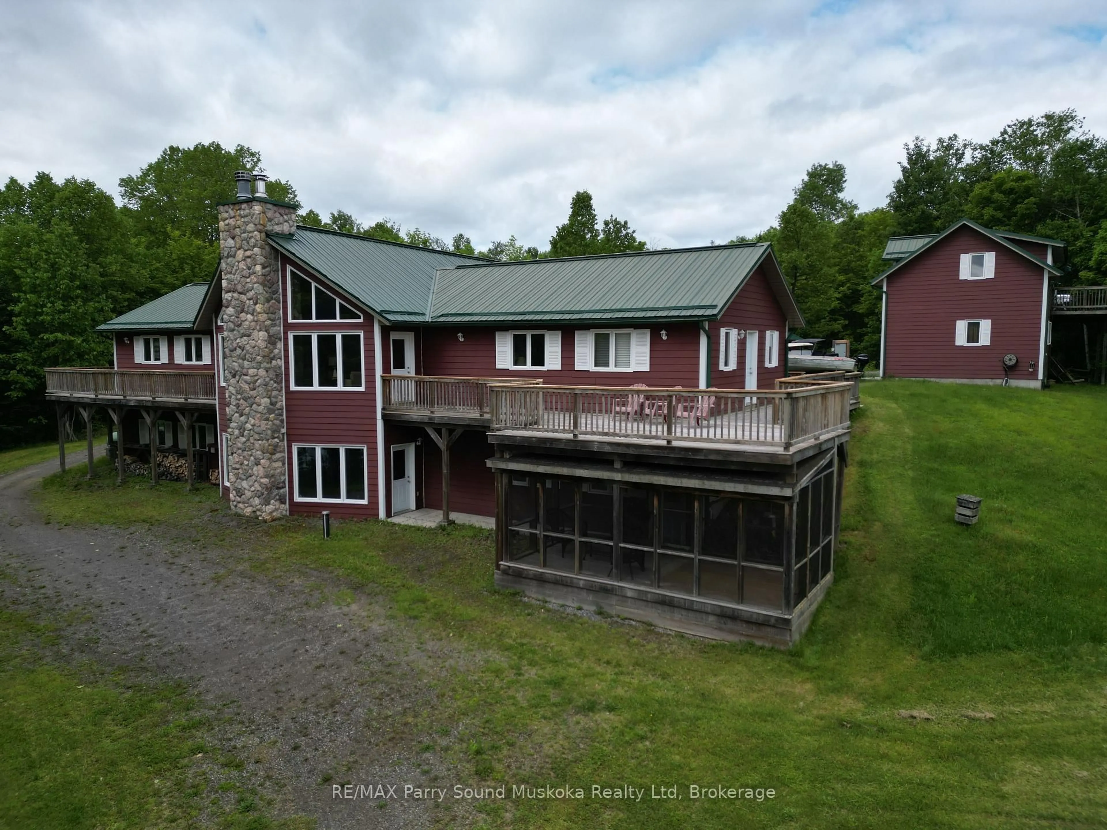 A pic from outside/outdoor area/front of a property/back of a property/a pic from drone, building for 1990 North Rd, Parry Sound Remote Area Ontario P0H 1S0