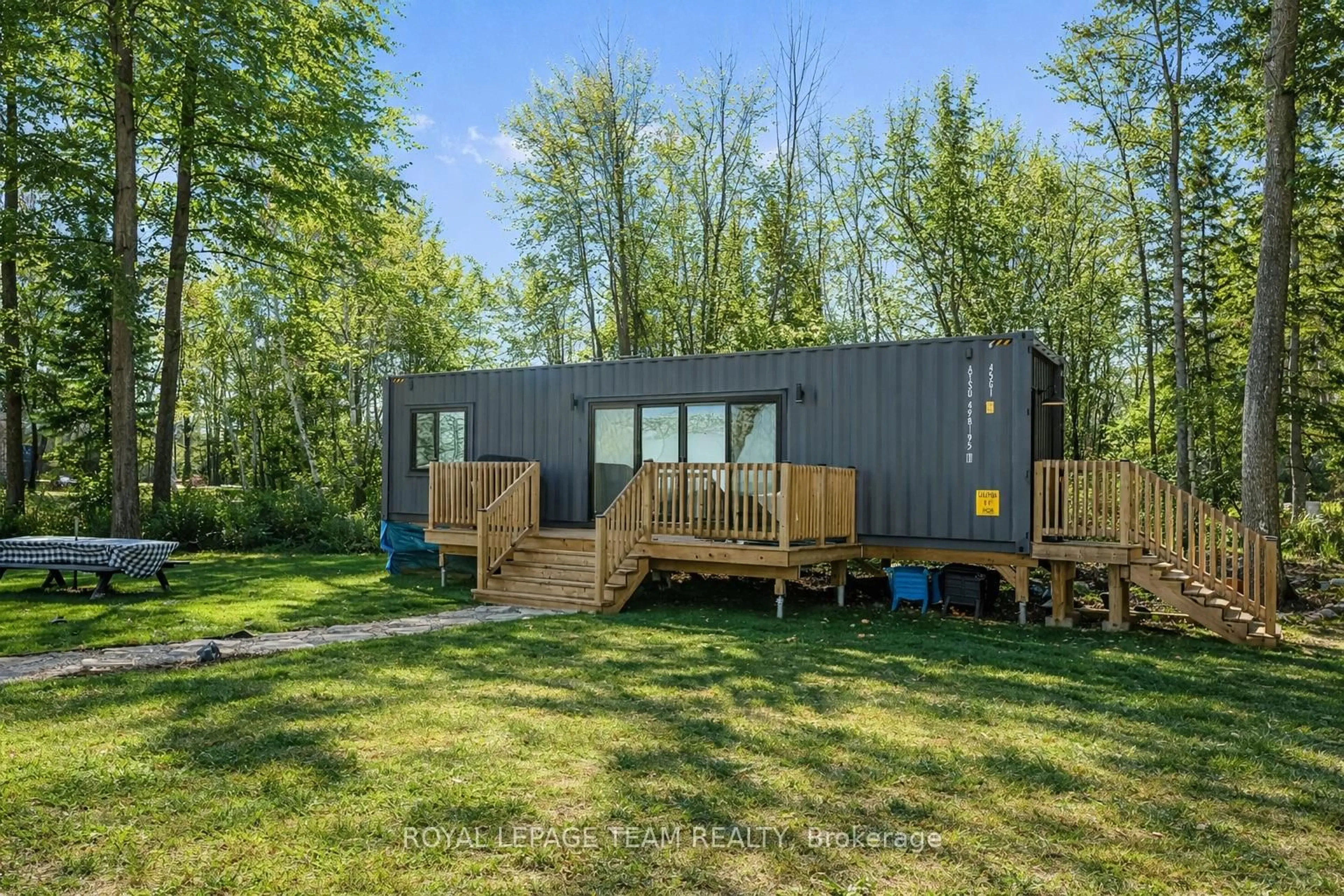 A pic from outside/outdoor area/front of a property/back of a property/a pic from drone, forest/trees view for 67 Great Heron Lane, Killaloe Ontario K0J 2A0