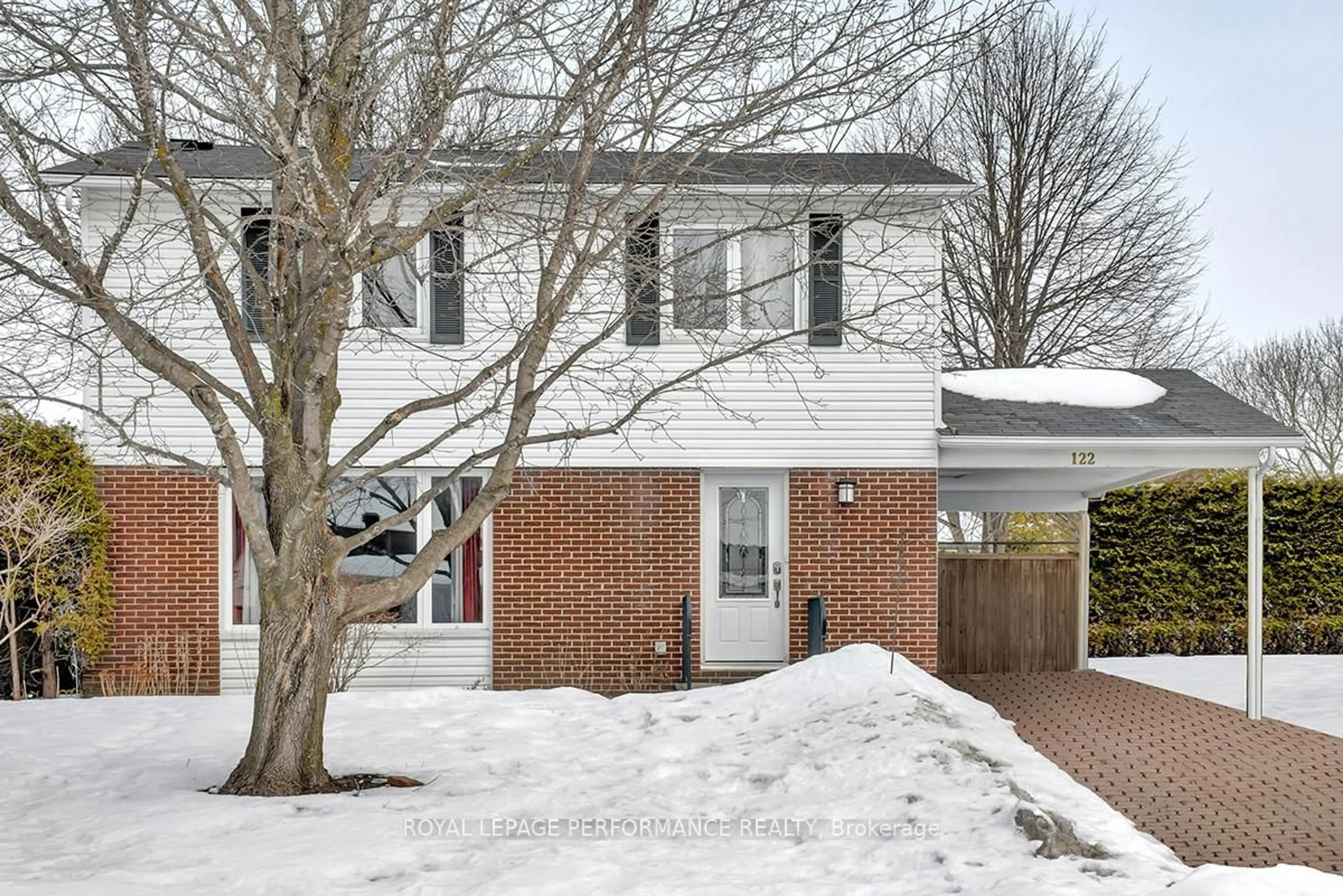 Home with brick exterior material, street for 122 Post Rd, Ottawa Ontario K2L 1L2