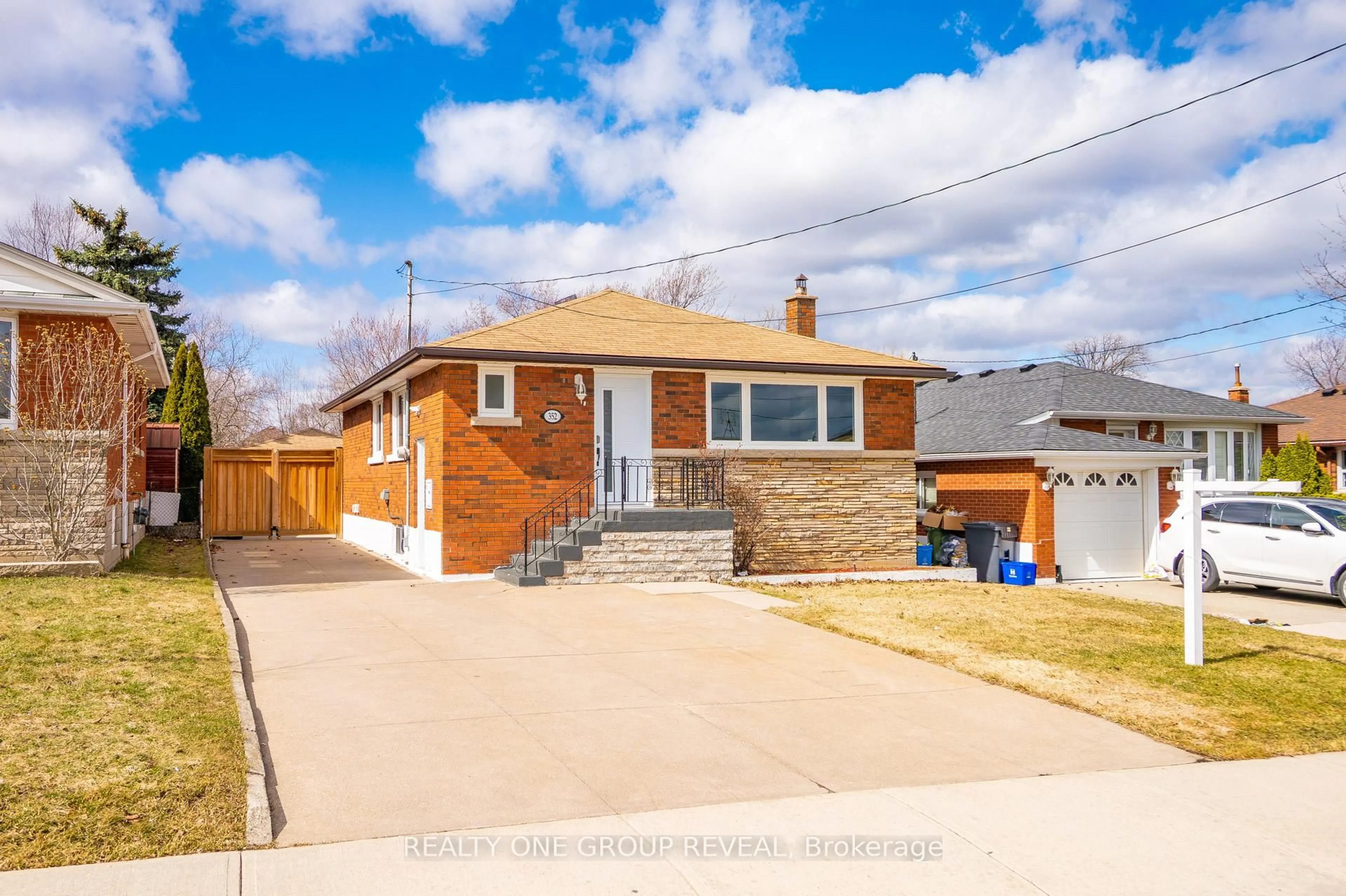 Home with brick exterior material, street for 352 East 42nd St, Hamilton Ontario L8T 3A7