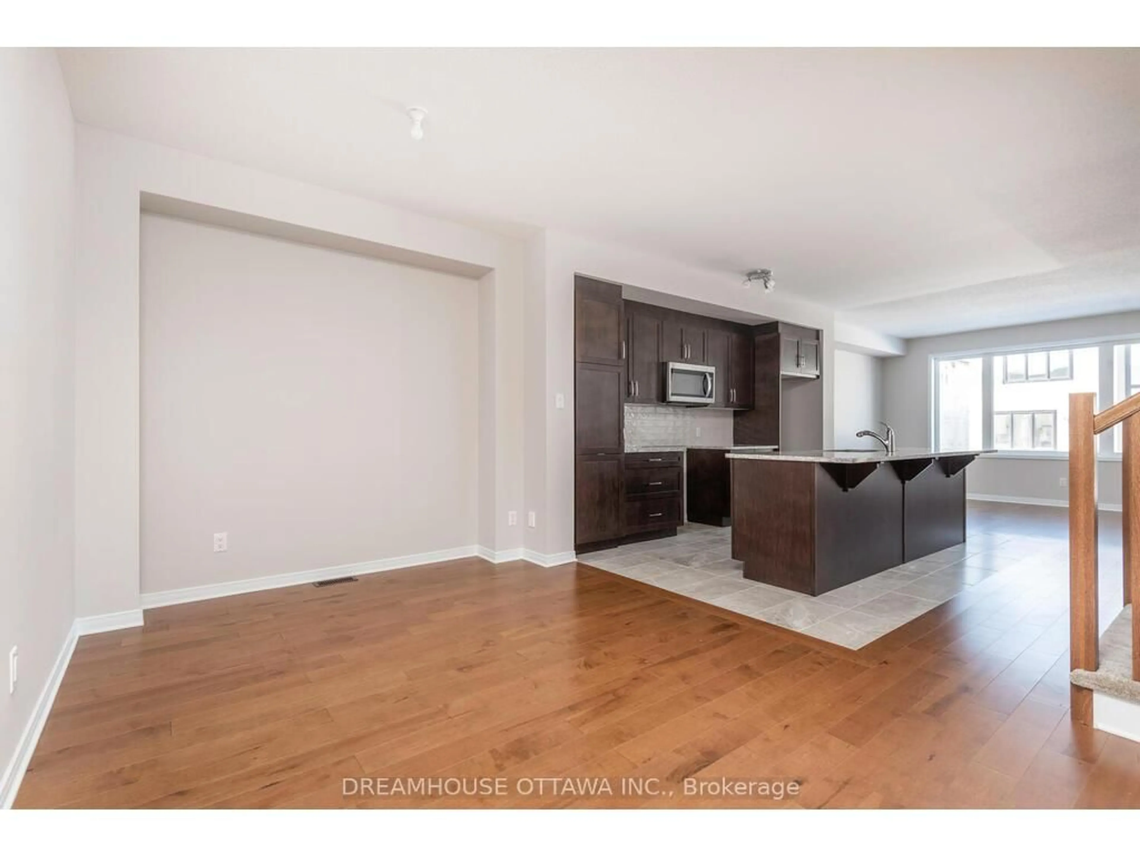 Open concept kitchen, wood/laminate floor for 459 Cope Dr, Ottawa Ontario K2V 0P1