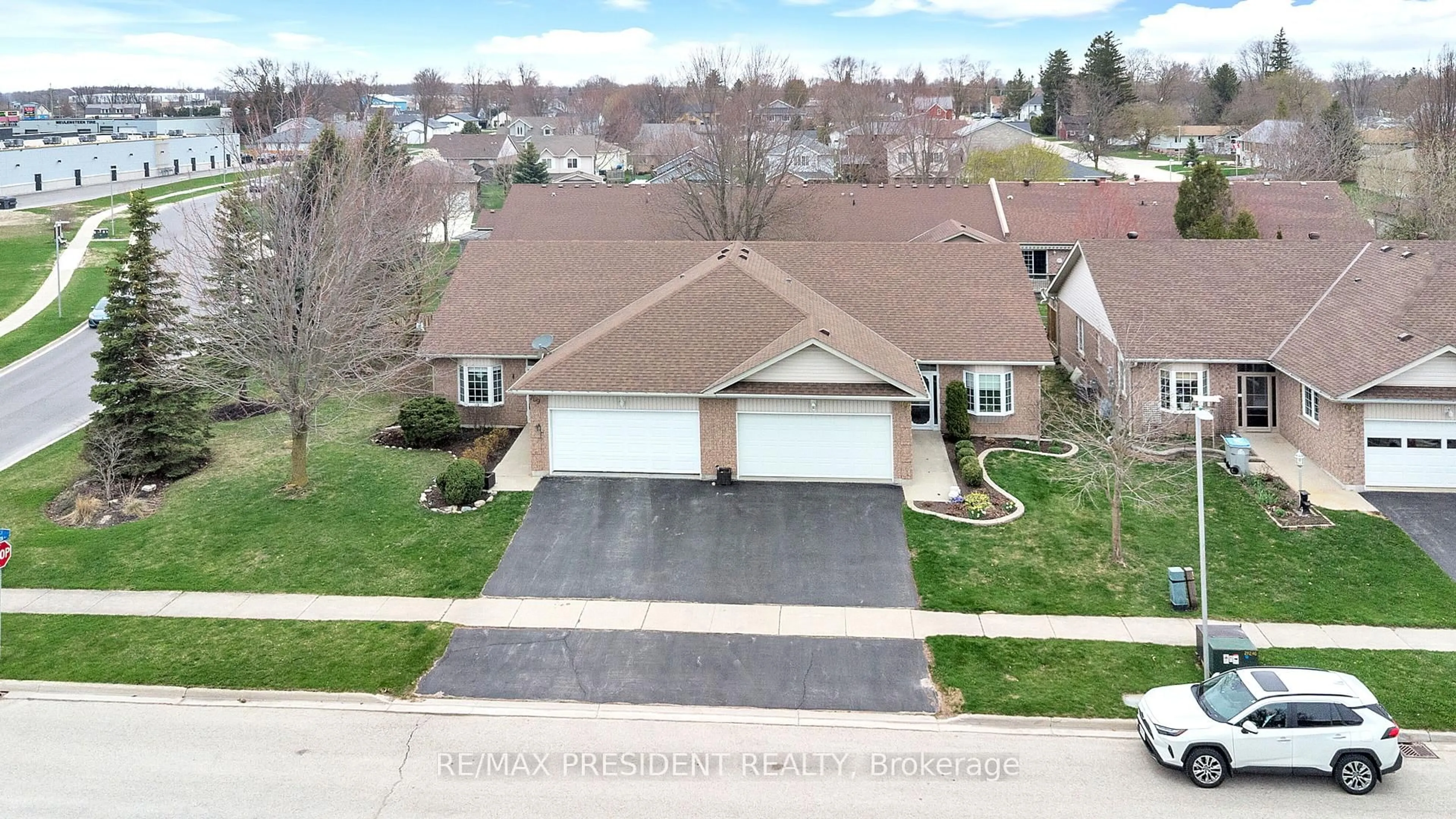 A pic from outside/outdoor area/front of a property/back of a property/a pic from drone, street for 789 Brock St, North Perth Ontario N4W 3T4