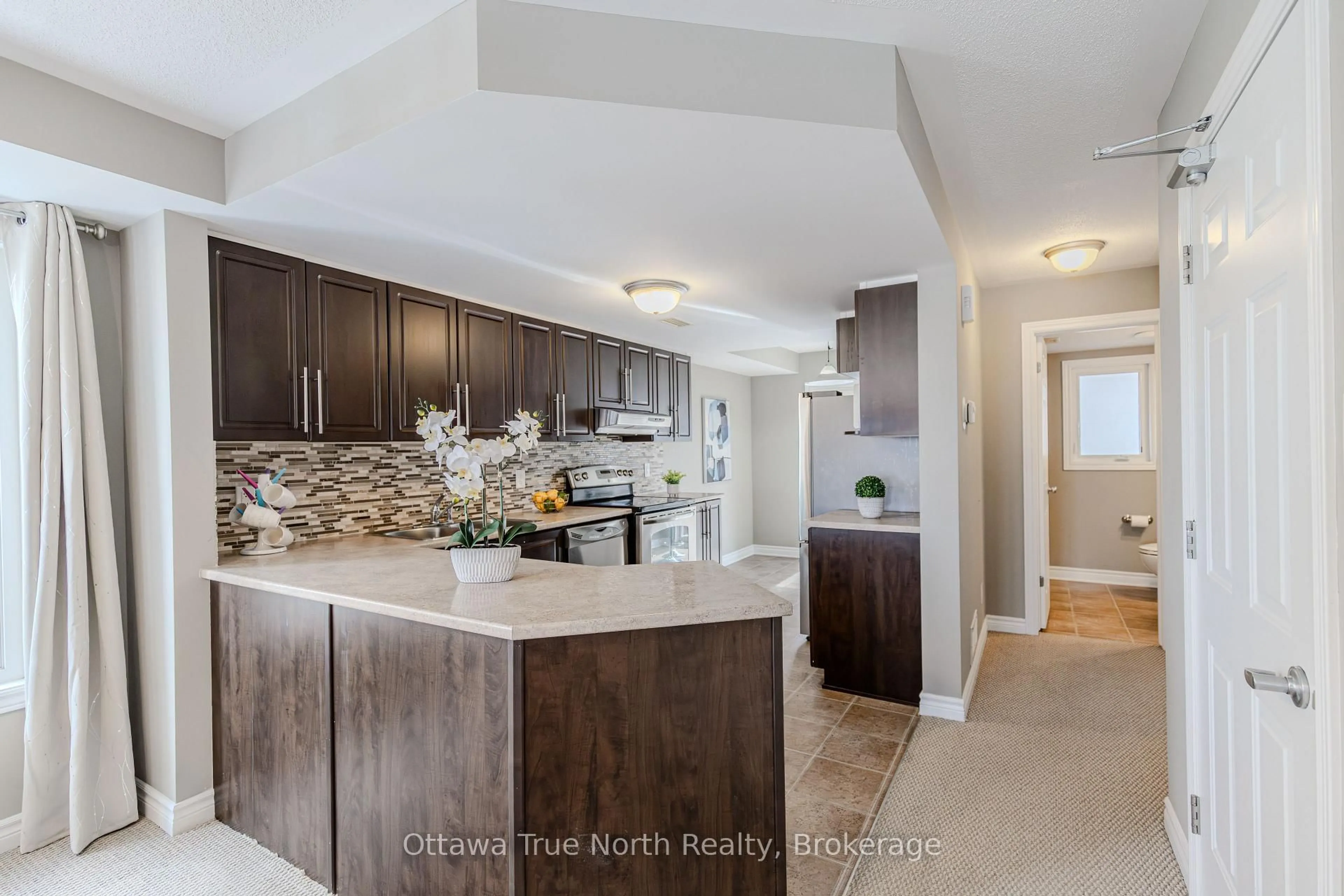 Open concept kitchen, ceramic/tile floor for 62 Argent Private #25, Ottawa Ontario K2K 0H2