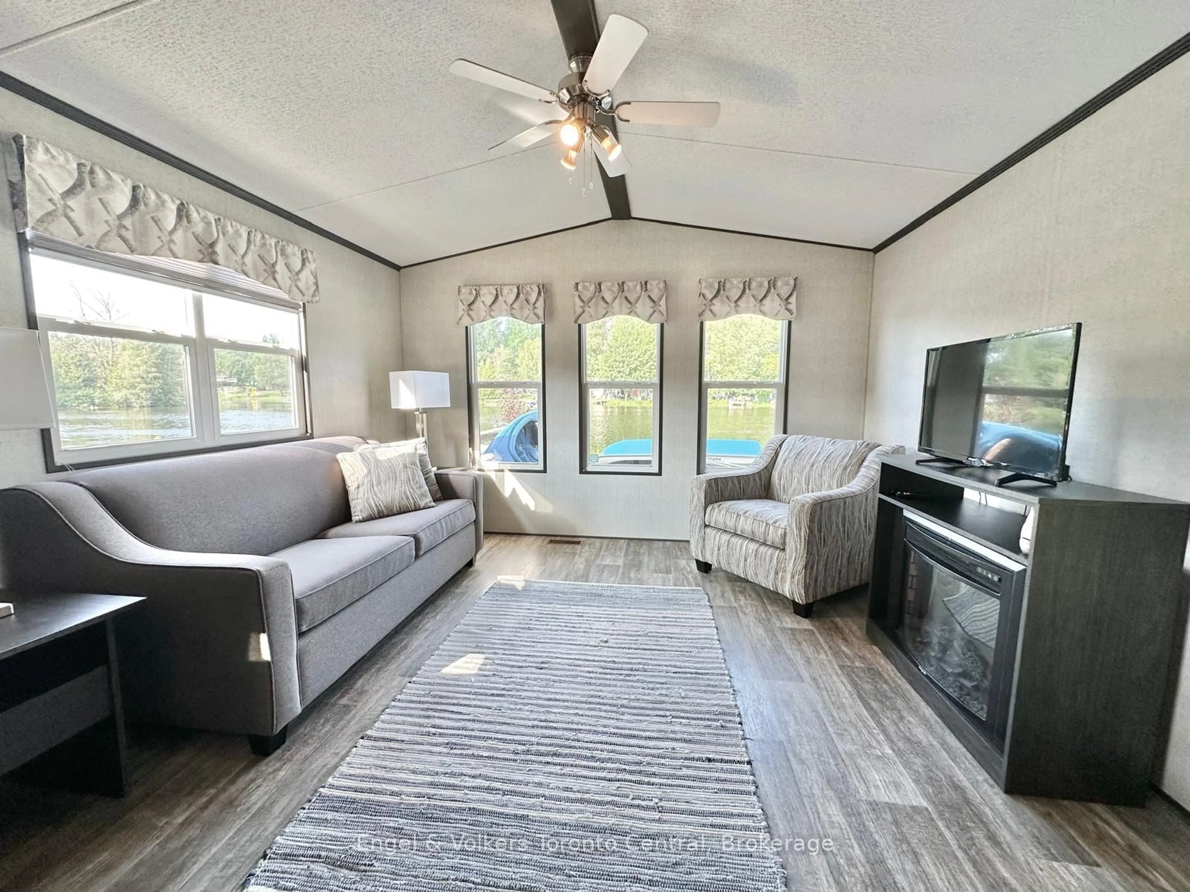 Living room with furniture, unknown for 7489 SIDEROAD 5 #B8, Wellington North Ontario N0G 2L0