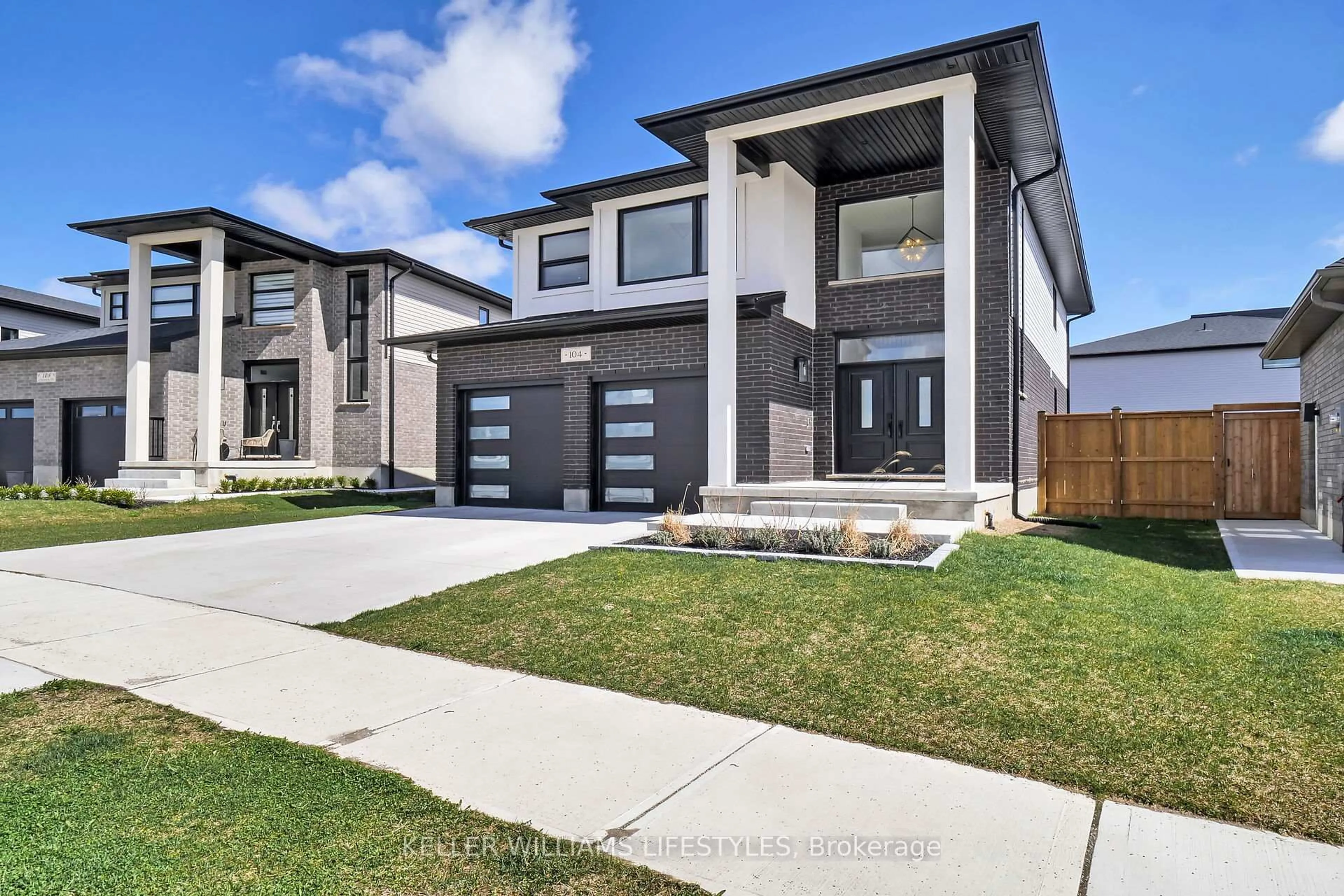 Home with brick exterior material, street for 104 Crestview Dr, Middlesex Centre Ontario N0L 1R0