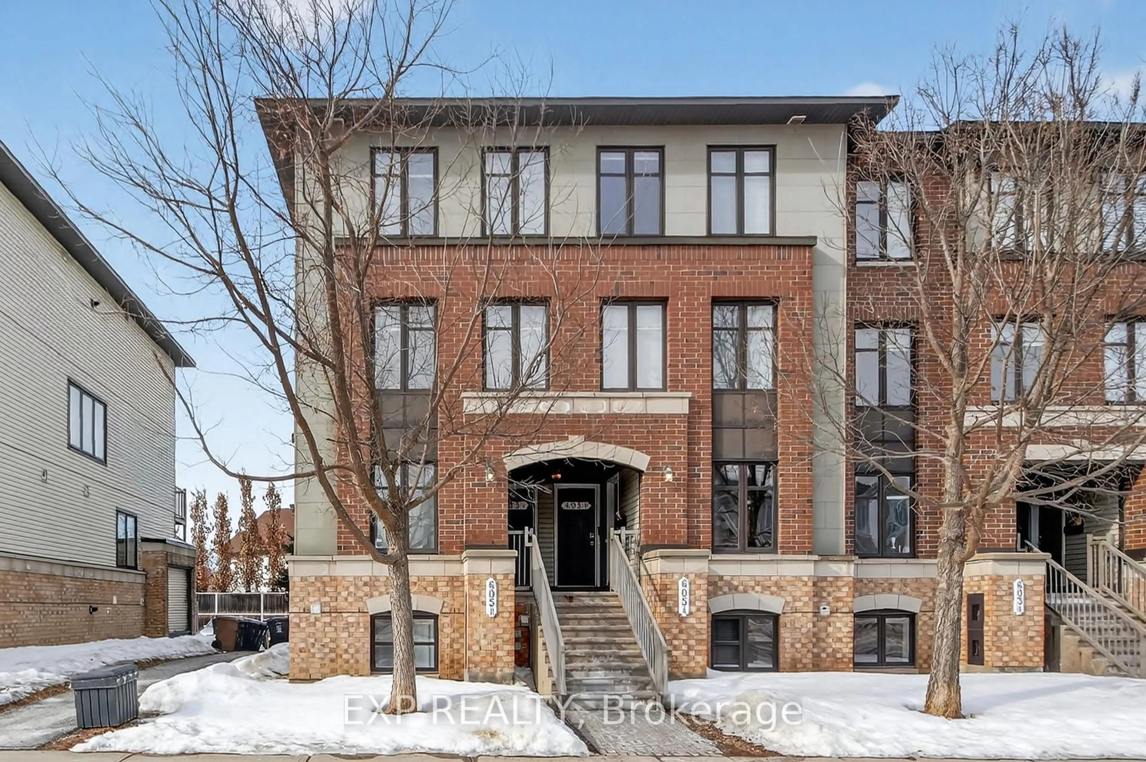 Home with brick exterior material, building for 605 B Chapman Mills Dr #32, Ottawa Ontario K2J 5T1
