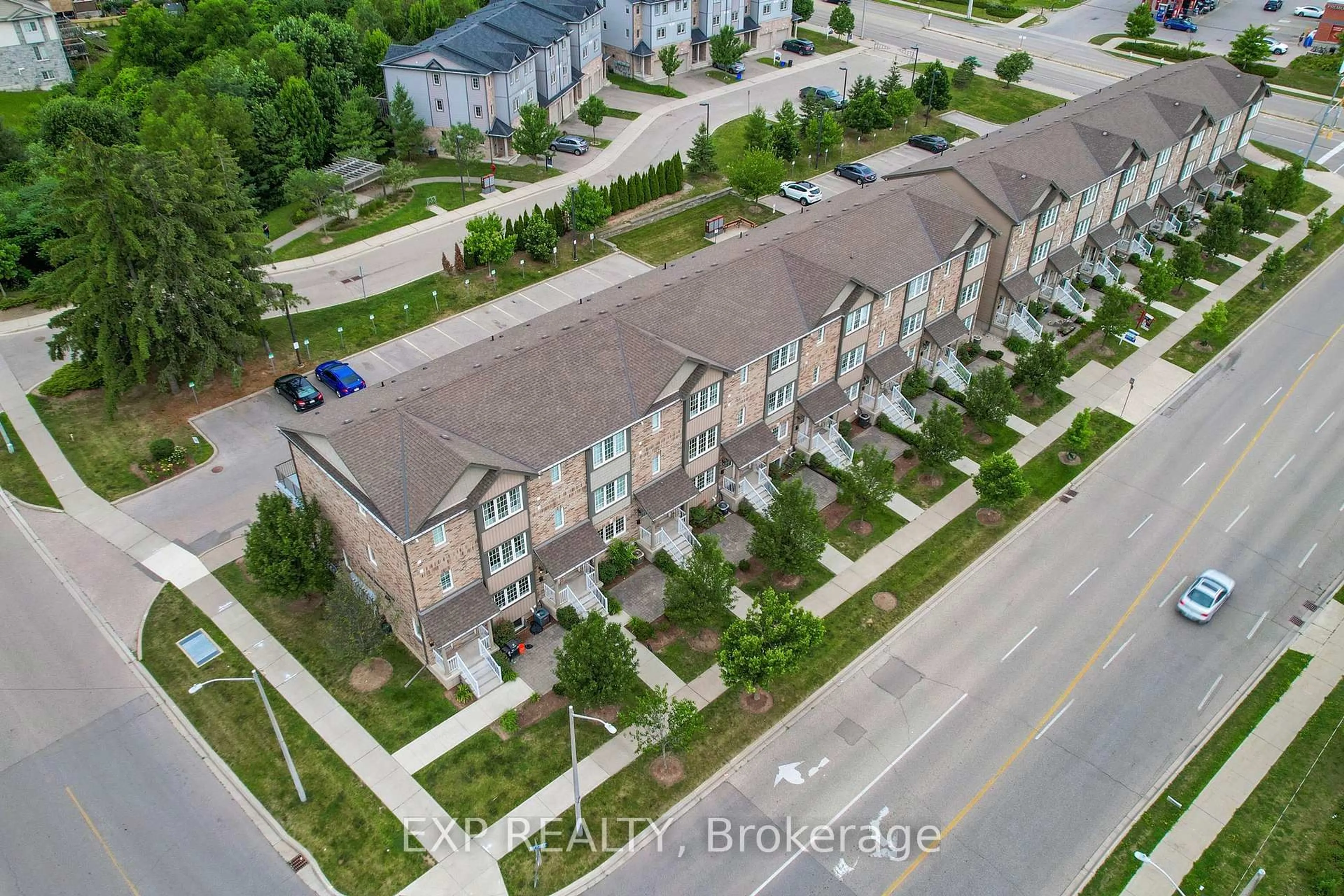 A pic from outside/outdoor area/front of a property/back of a property/a pic from drone, street for 275 Old Huron Rd #3, Kitchener Ontario N2R 1P9