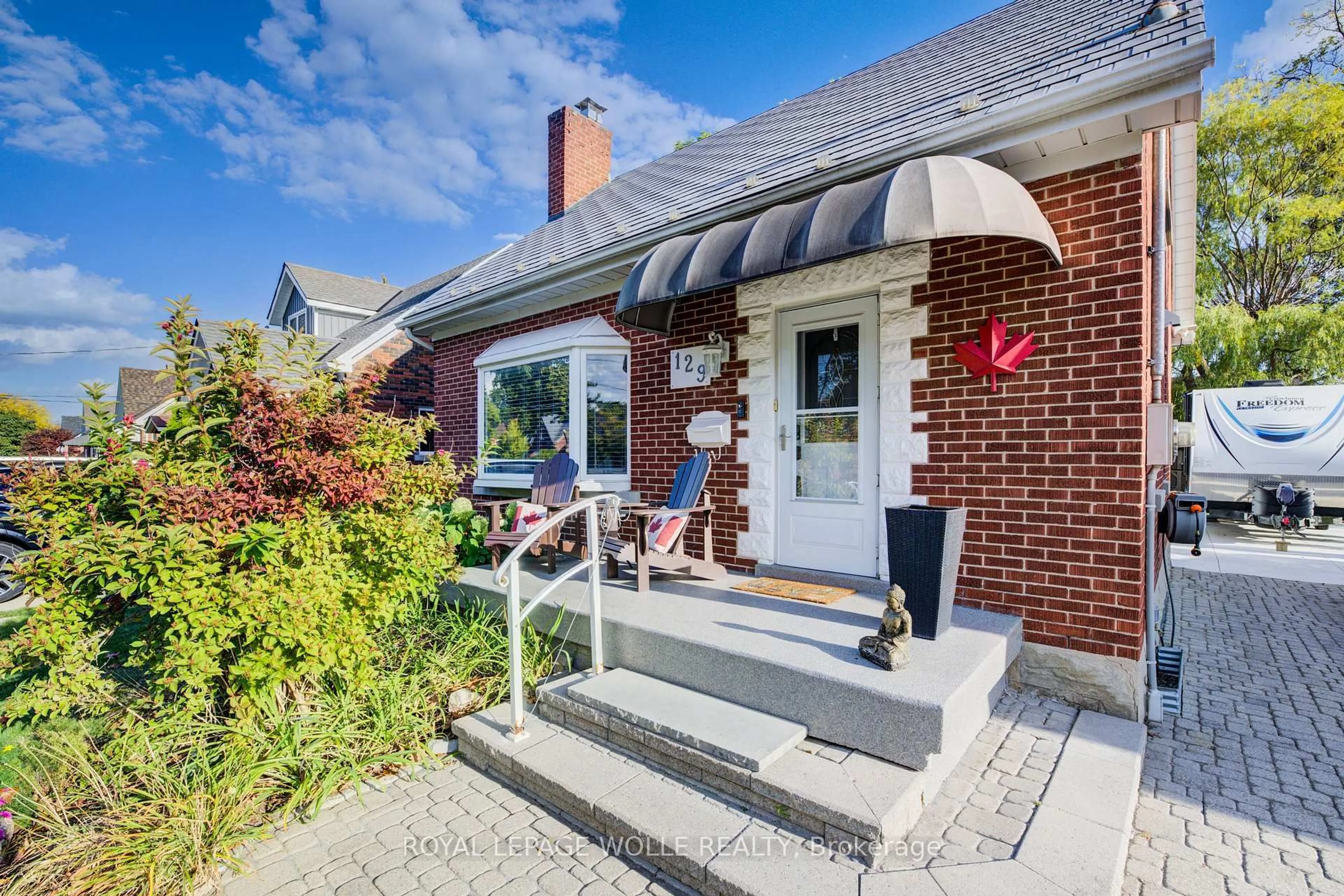 Home with brick exterior material, street for 129 Talbot St, Kitchener Ontario N2M 2B2