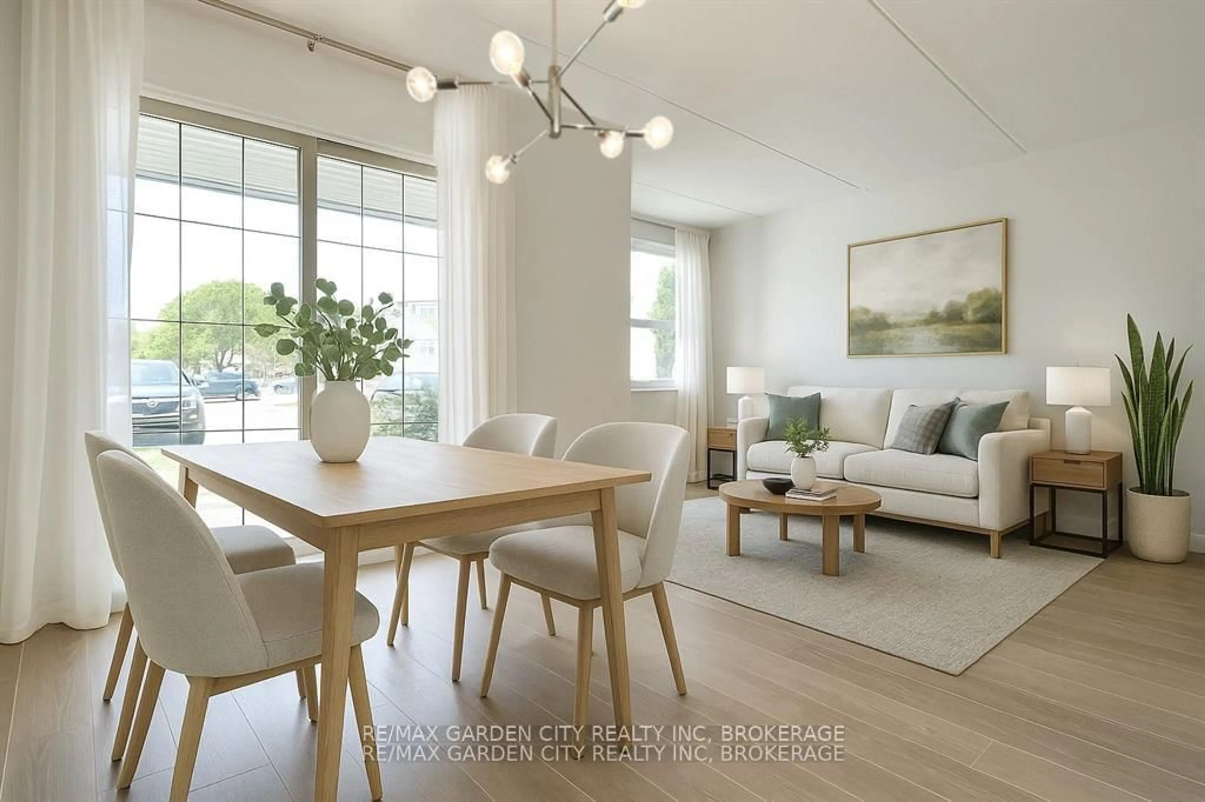 Living room with furniture, wood/laminate floor for 41 Rykert St #311, St. Catharines Ontario L2S 3A4