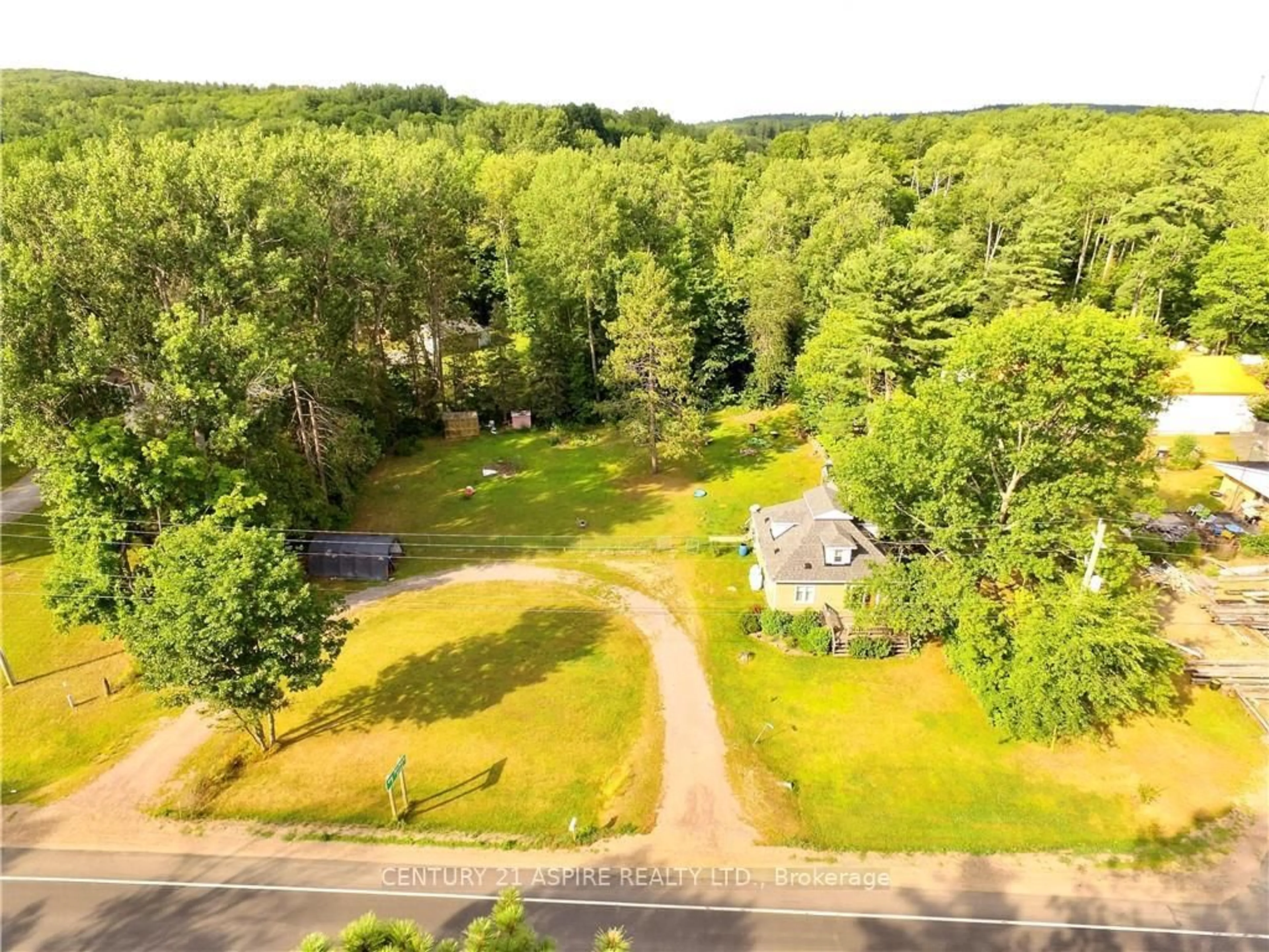 A pic from outside/outdoor area/front of a property/back of a property/a pic from drone, forest/trees view for 13314 60 Highway, Golden Lake Ontario K0J 1X0