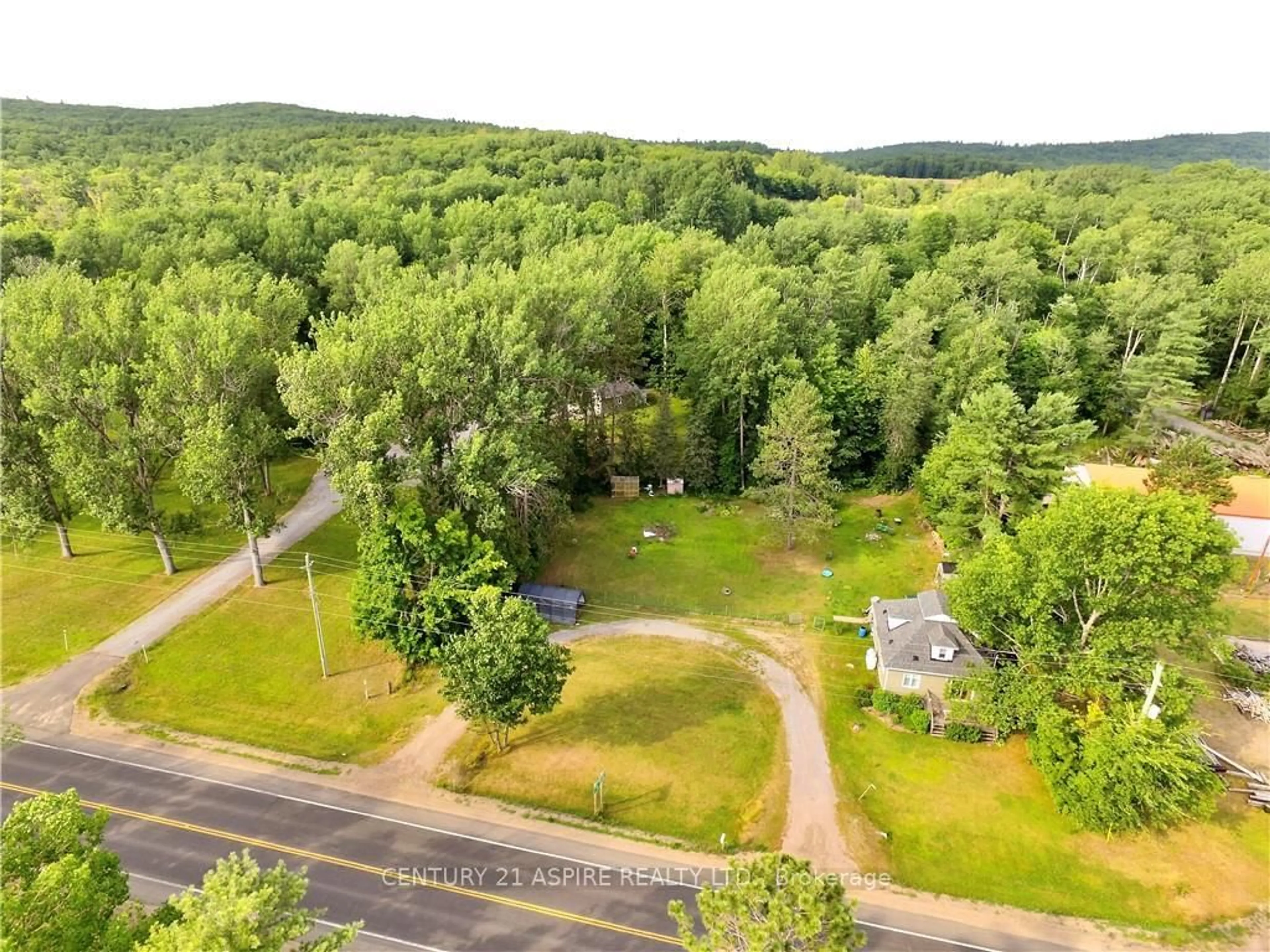 A pic from outside/outdoor area/front of a property/back of a property/a pic from drone, forest/trees view for 13314 60 Highway, Golden Lake Ontario K0J 1X0